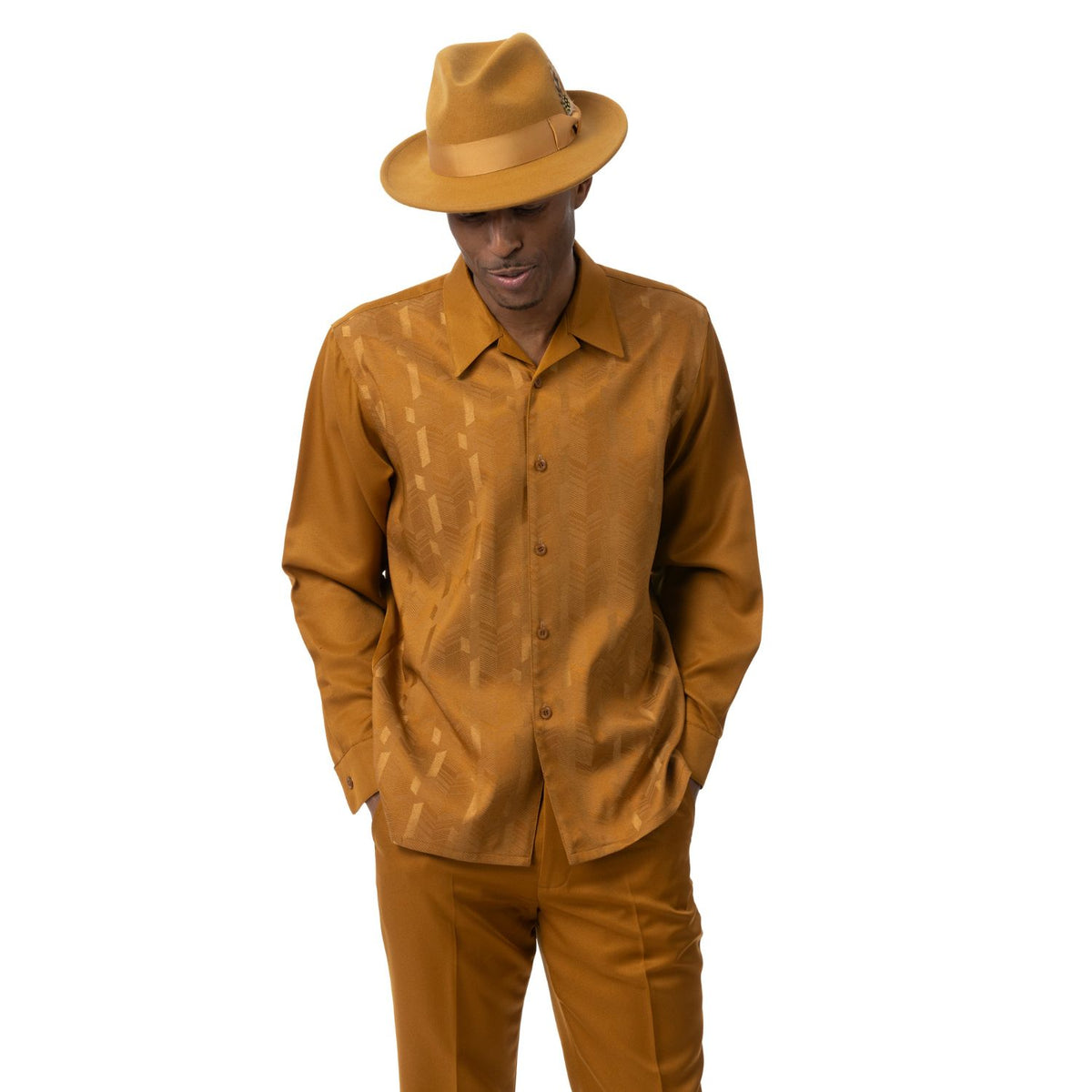 Model wearing the gold geometric long-sleeve shirt and matching pants by Montique