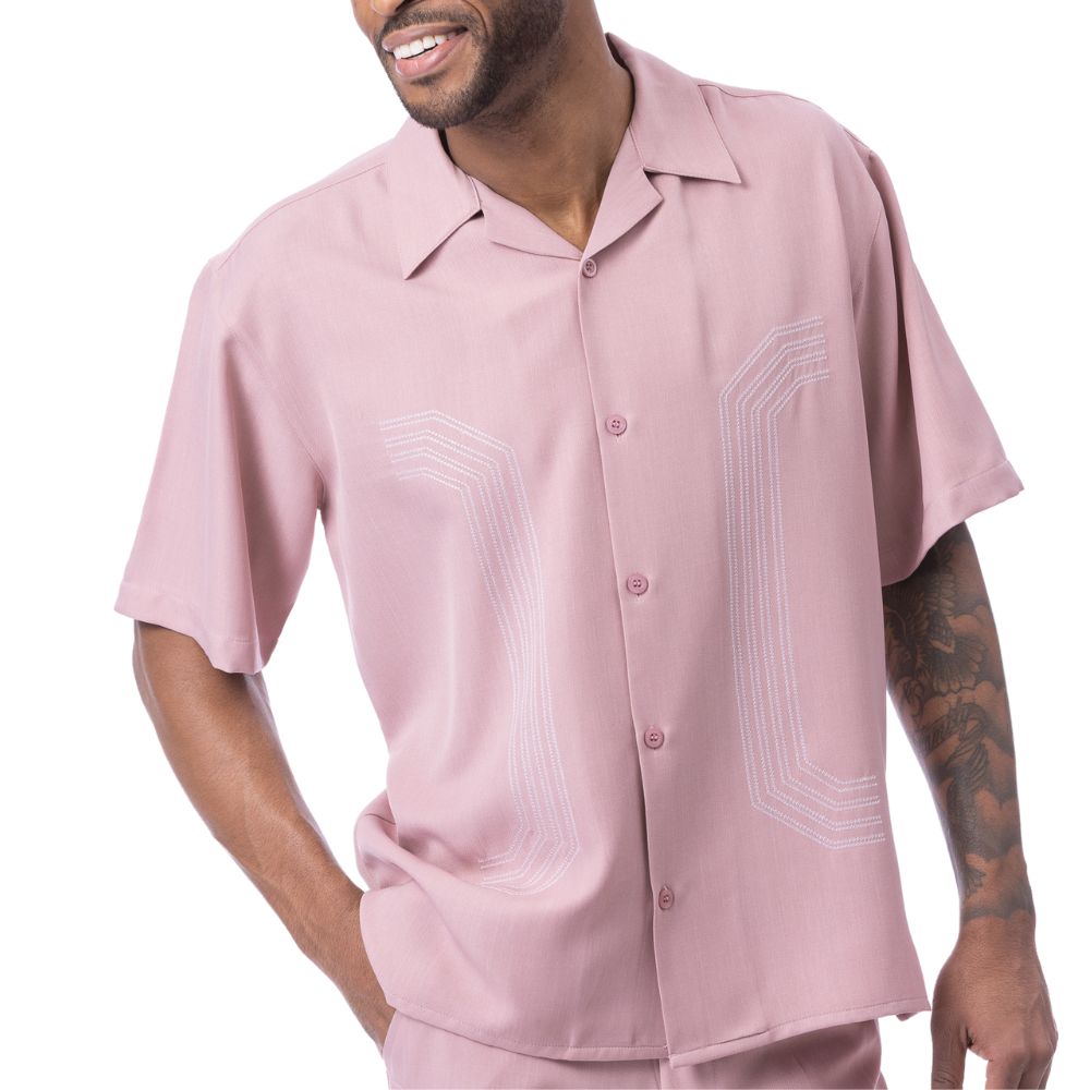 Close up of embroidered panel detail on blush walking suit shirt