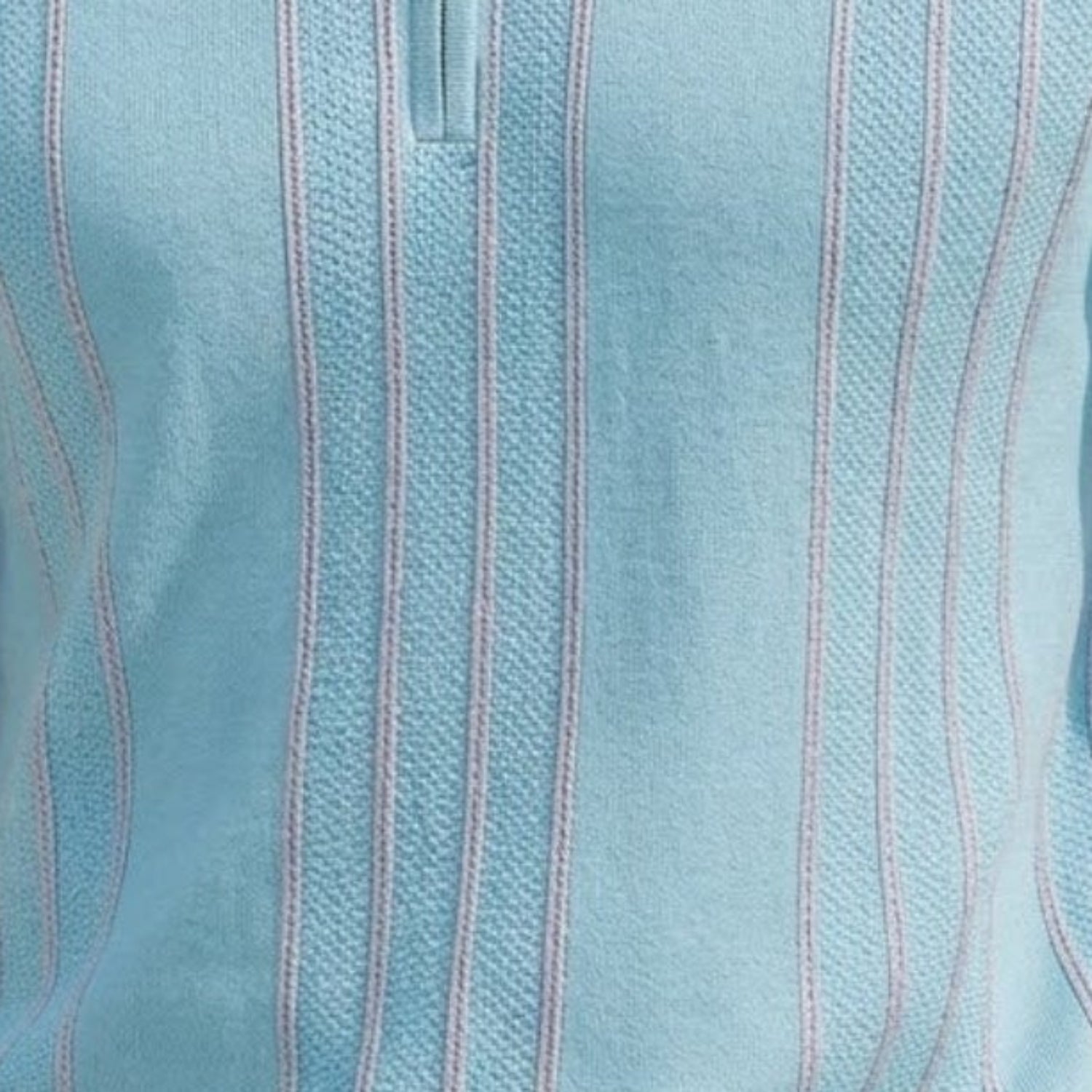 Close-up of the blue Stacy Adams knit polo showing the vertical textured pattern and metallic zip hardware