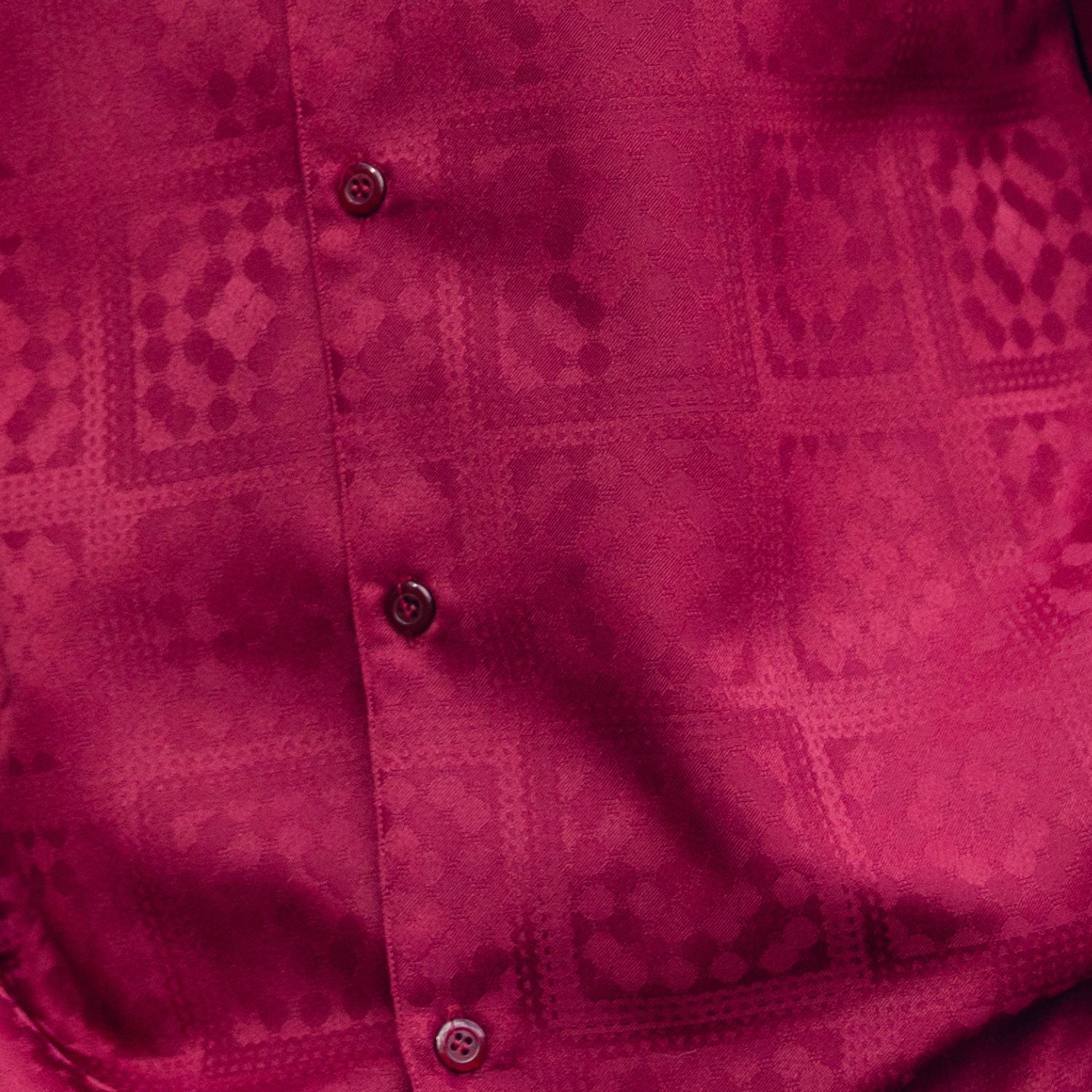 Close up of the burgundy tonal check walking suit with short sleeve shirt and matching pants