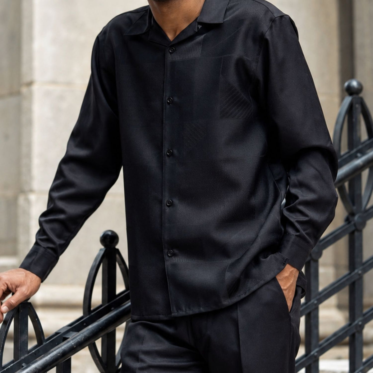 Black Montique long sleeve walking suit with tonal patchwork shirt front detail