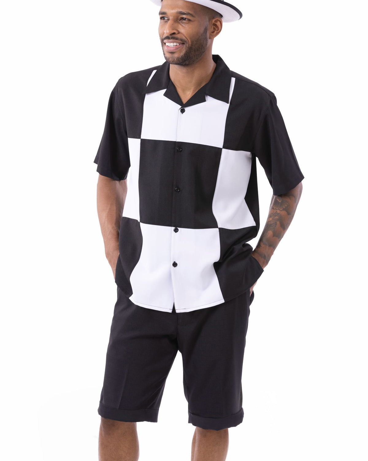 man wearing black and white color block 2-piece walking shorts set by Montique