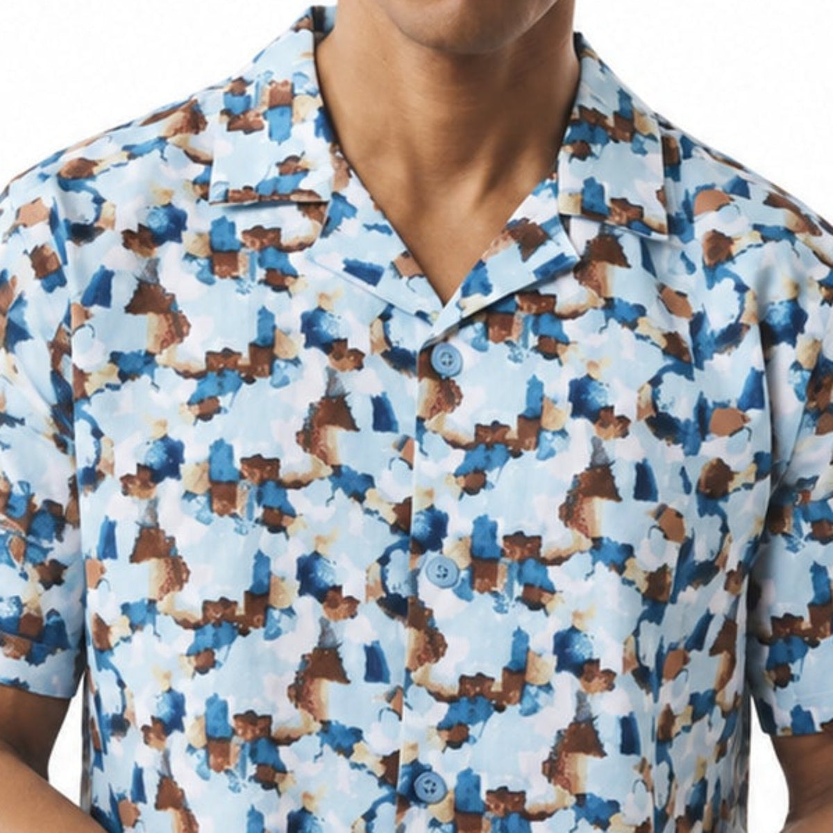 close up of blue abstract watercolor print linen shirt pattern