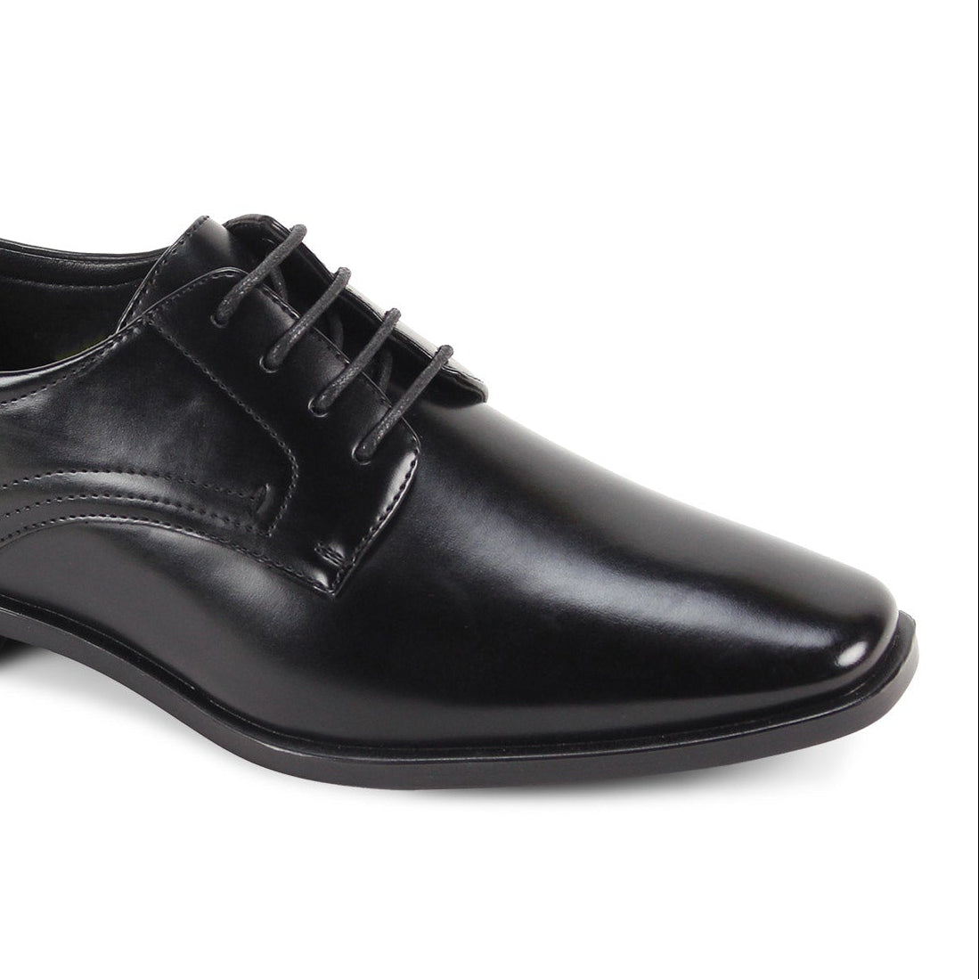 Close-up of men’s black plain-toe lace-up dress shoe
