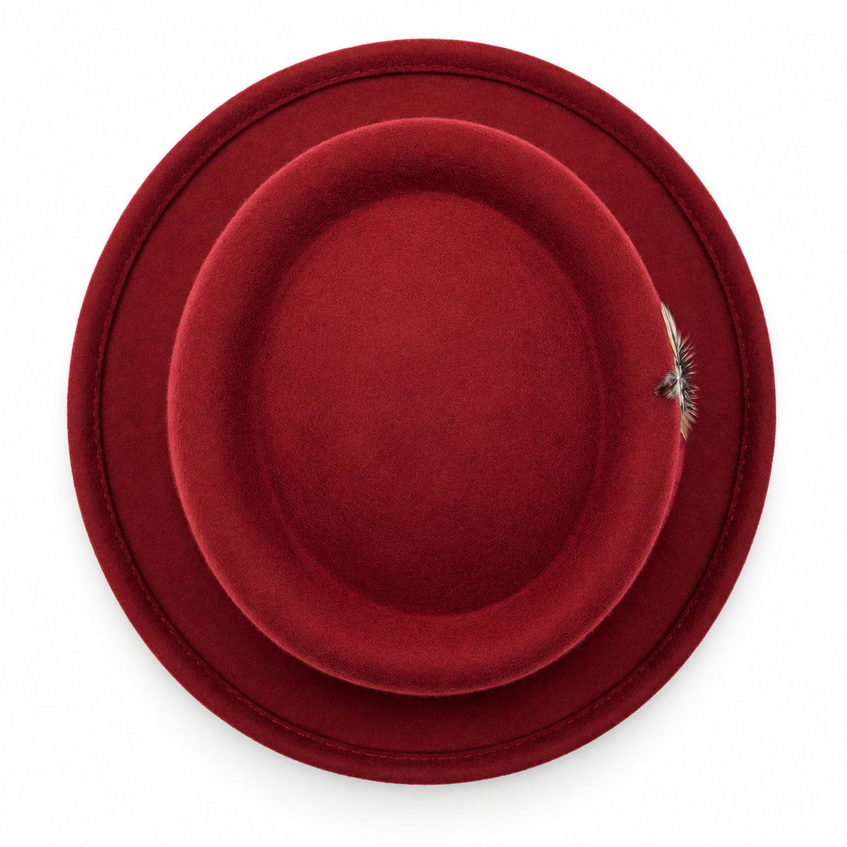 burgundy pork pie wool felt hat by Montique top view with wide brim and feather accent