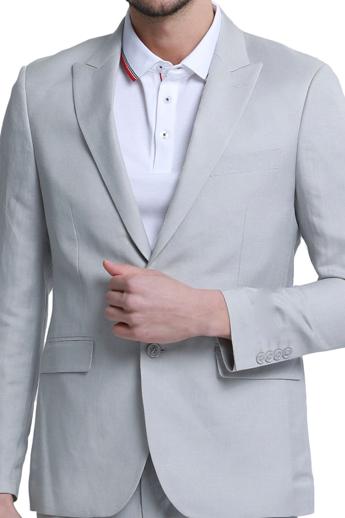 Grey 2-piece suit detail showing peak lapels and solid