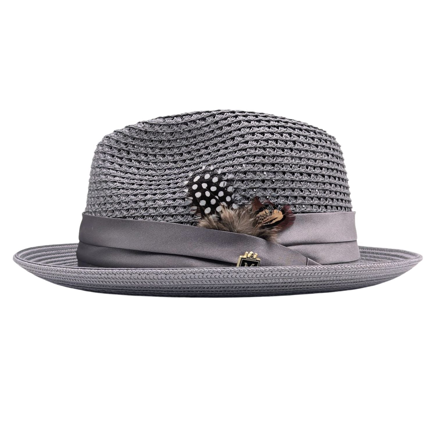 Grey Montique fedora hat side view with open weave crown, satin ribbon band, logo pin, and clean white brim