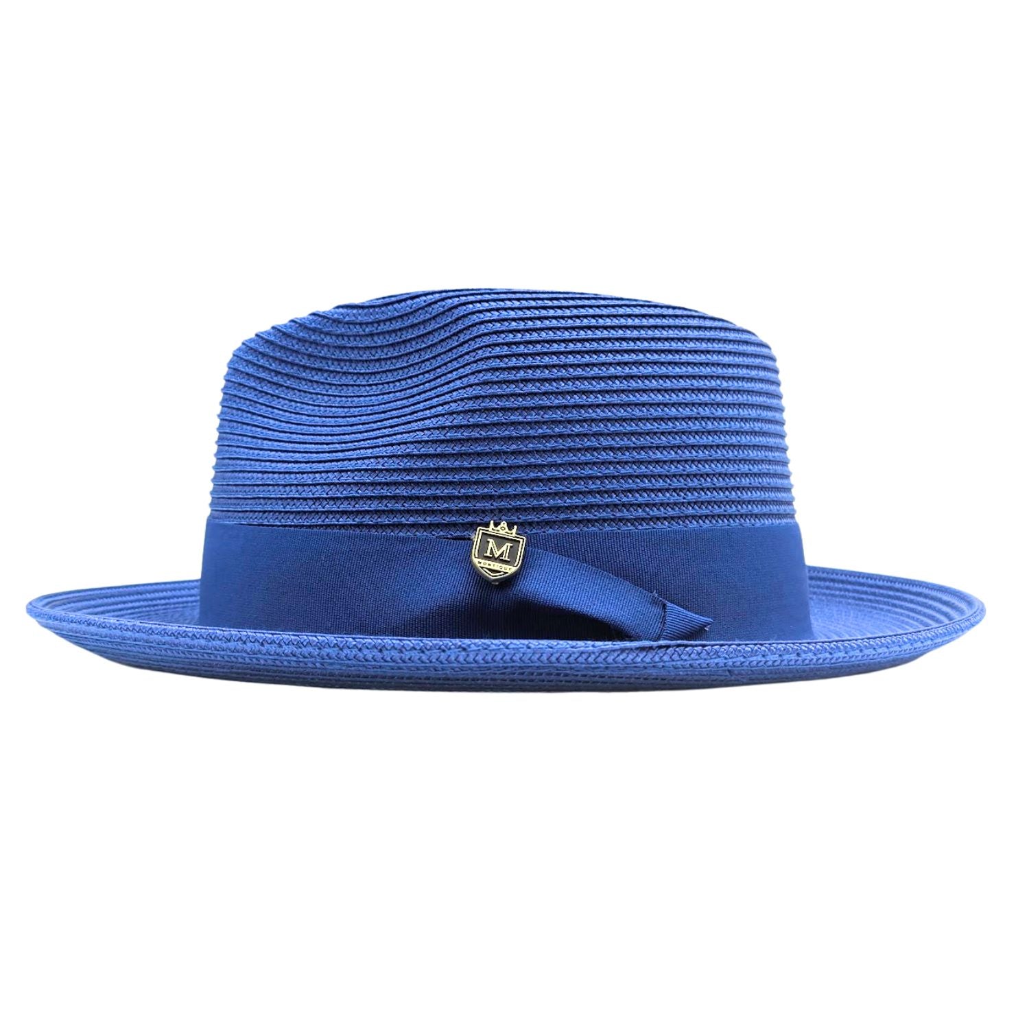 Royal blue Montique fedora hat side view with pinch crown, wide brim, matching ribbon band, and side logo pin