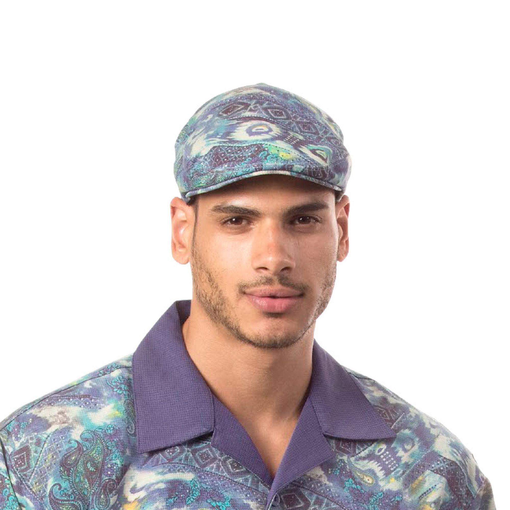 man wearing navy designer ivy cap camo paisley pattern