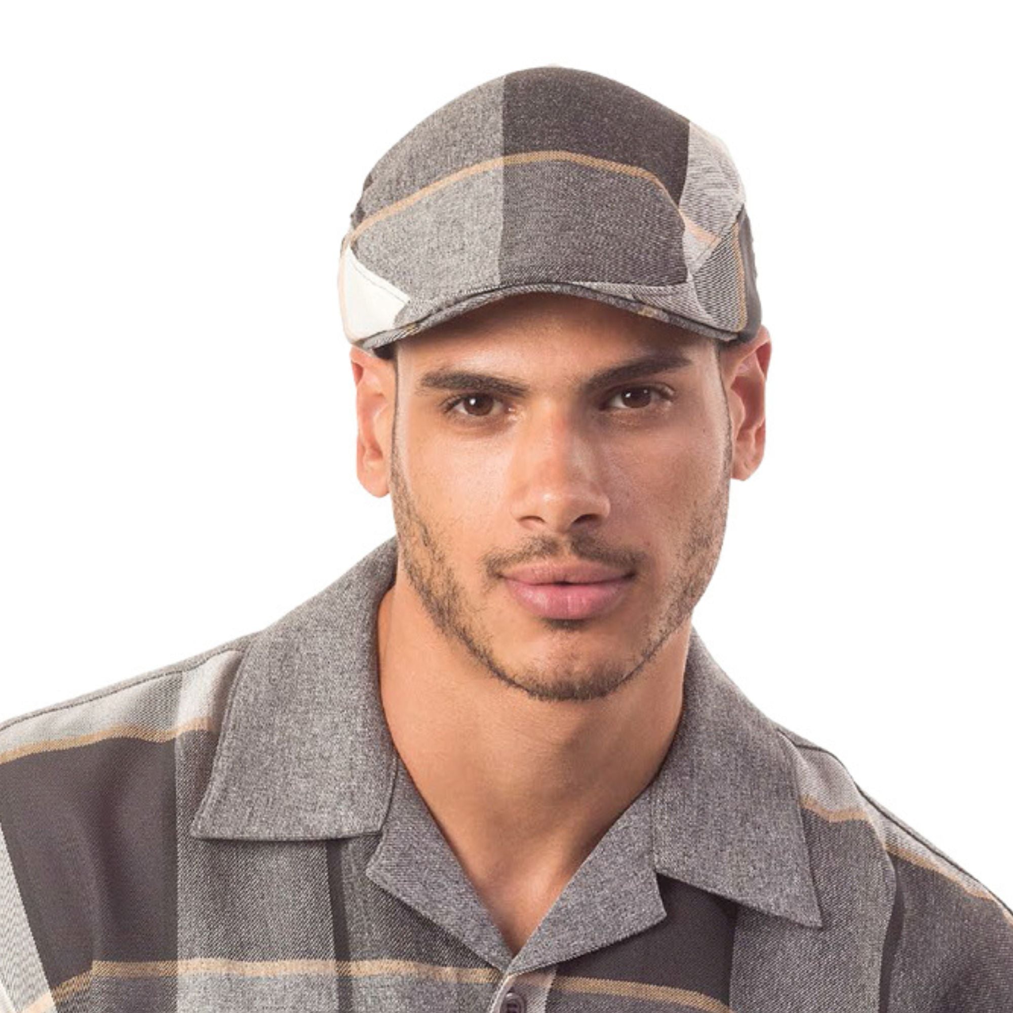 man wearing grey checkered ivy cap