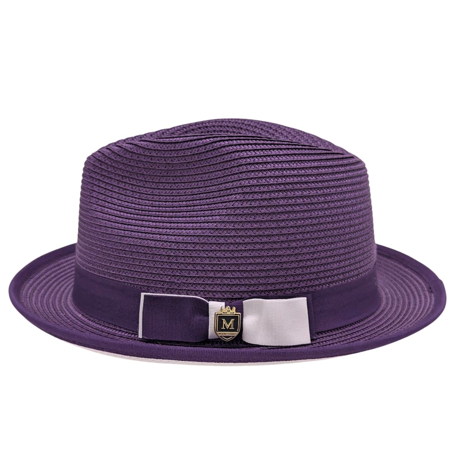Montique purple straw fedora hat side view with purple crown, ribbon band, two-tone bow, and gold logo pin