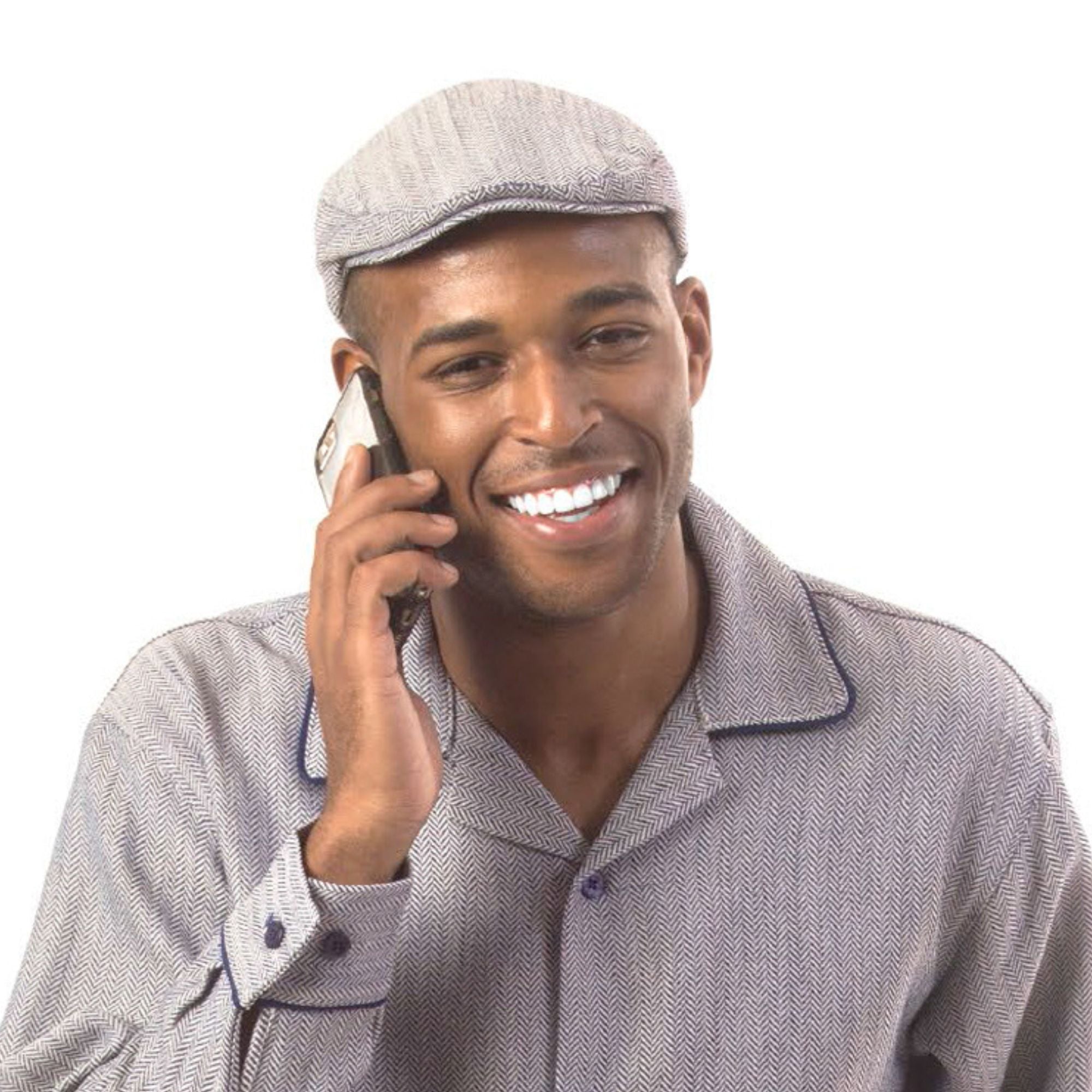 man wearing black herringbone ivy cap lifestyle view