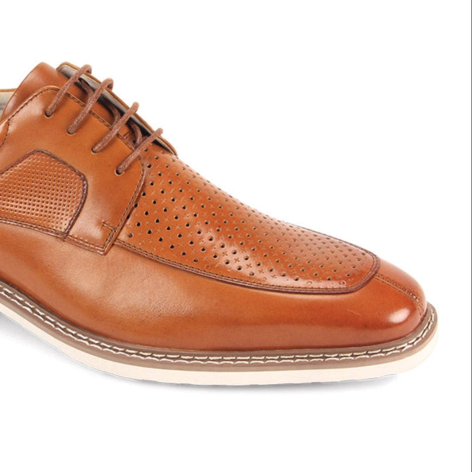 close-up perforated leather detail tan moc toe dress shoe