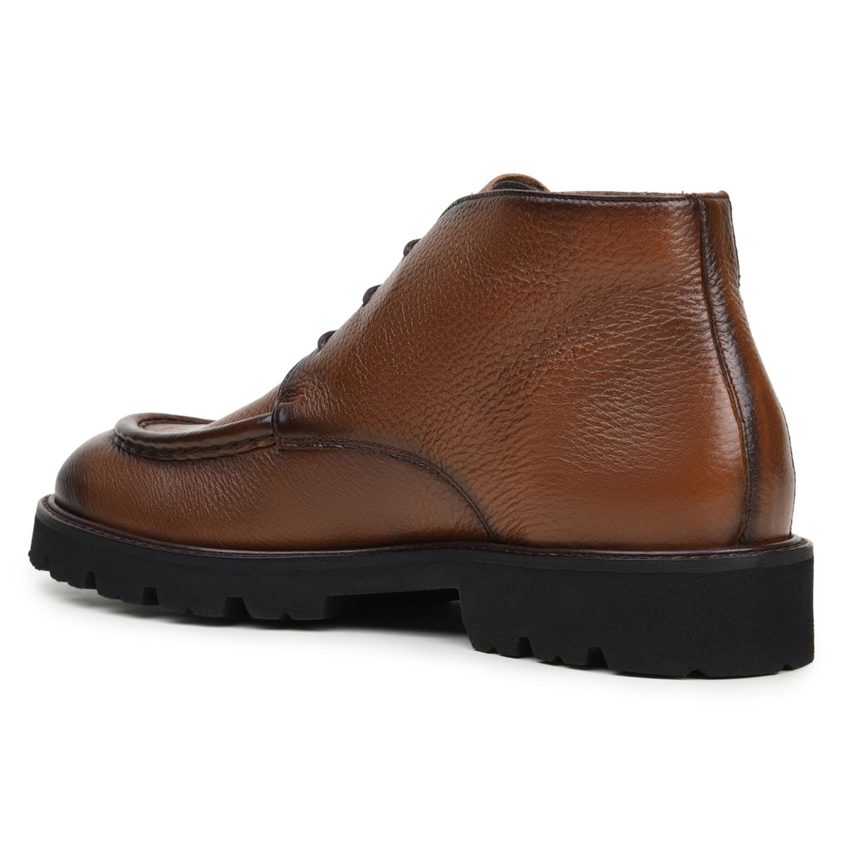 Angled view of antique tan Belvedere calfskin chukka boot