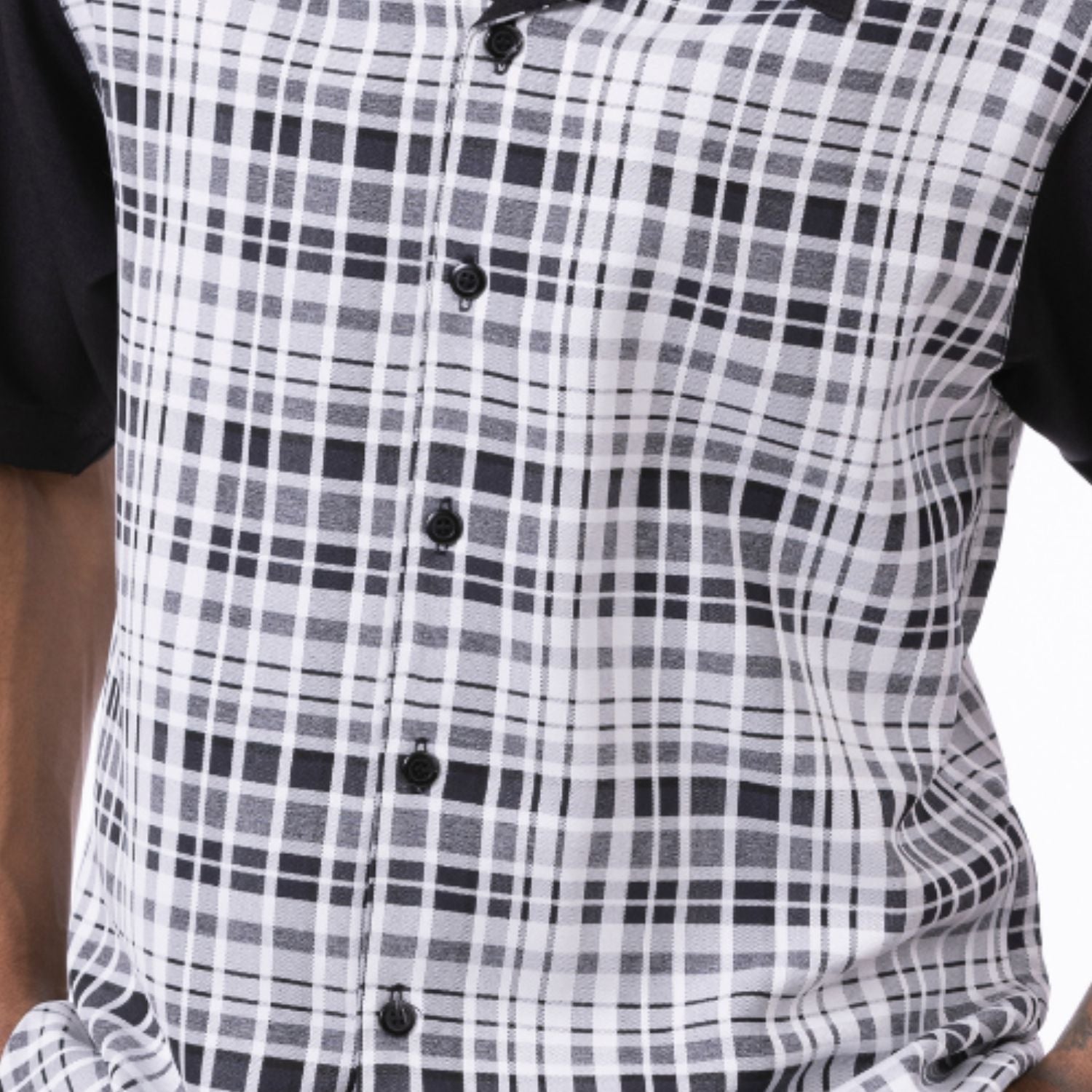 Close up of the men's black plaid short sleeve walking suit with matching cuffed shorts