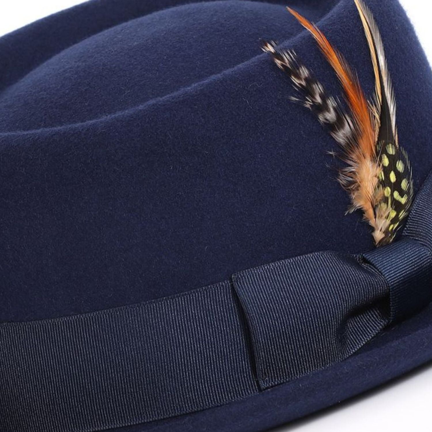 navy pork pie wool felt hat with feather accent by montique