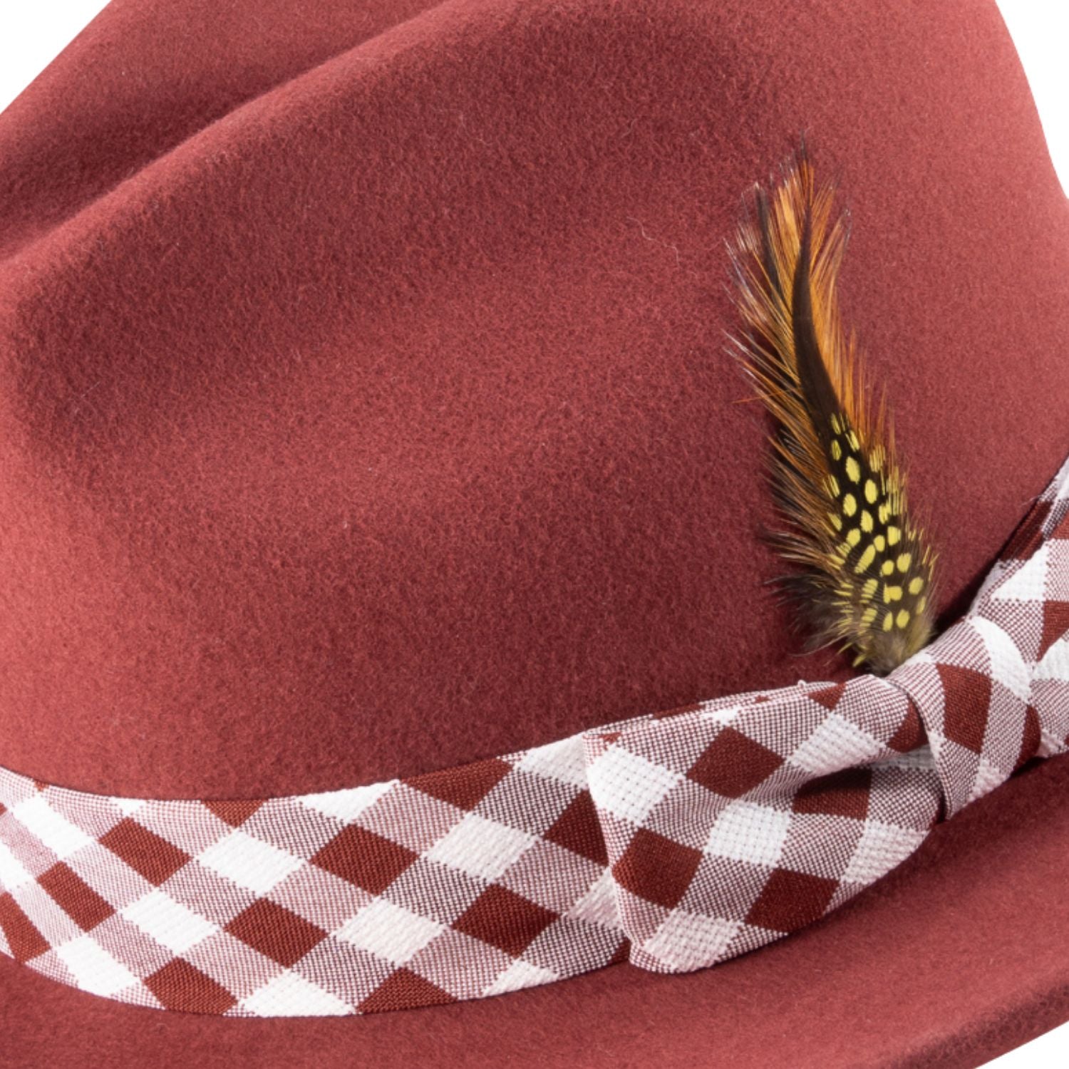 brick wool fedora with matching plaid ribbon and feather detail