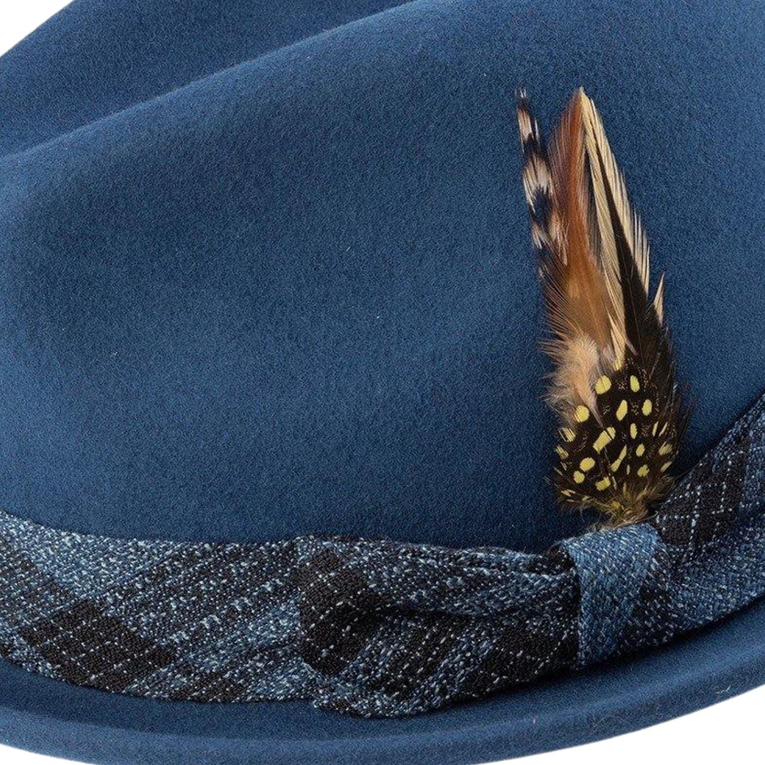 side view of sapphire felt pinch hat with feather detail