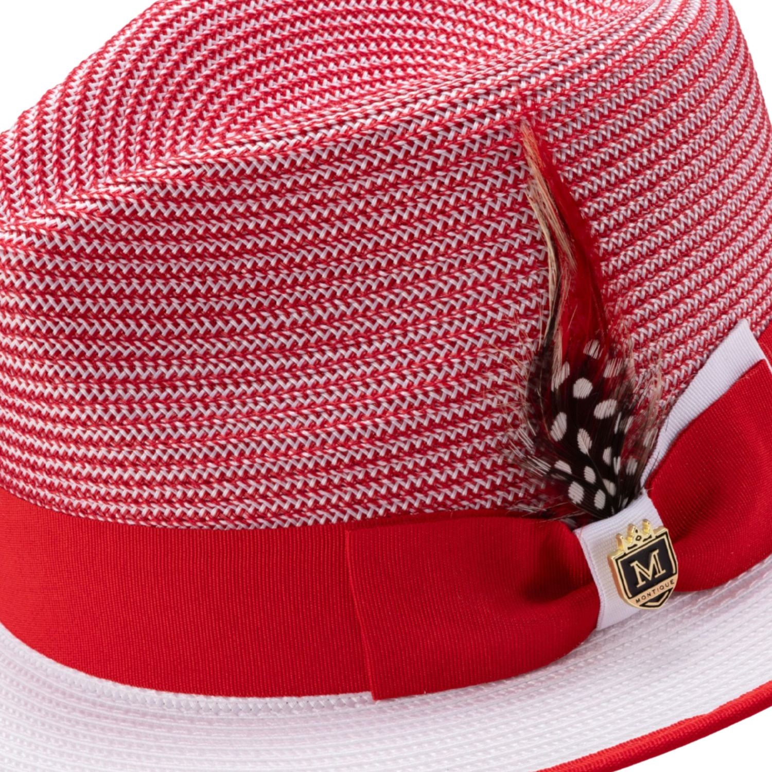 Side detail of red and white Montique fedora hat with grosgrain ribbon and feather