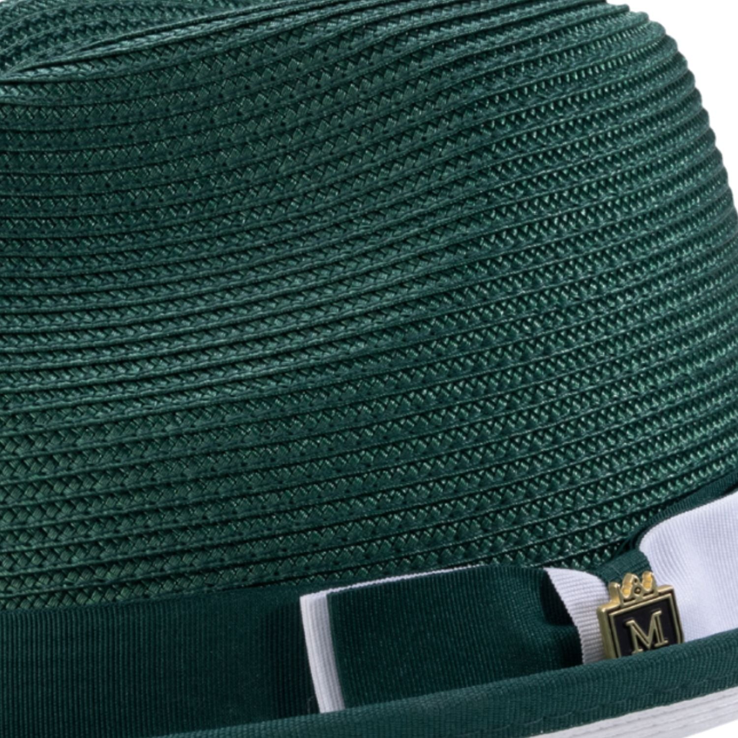Emerald green straw hat with a green white ribbon and gold emblem on a white background