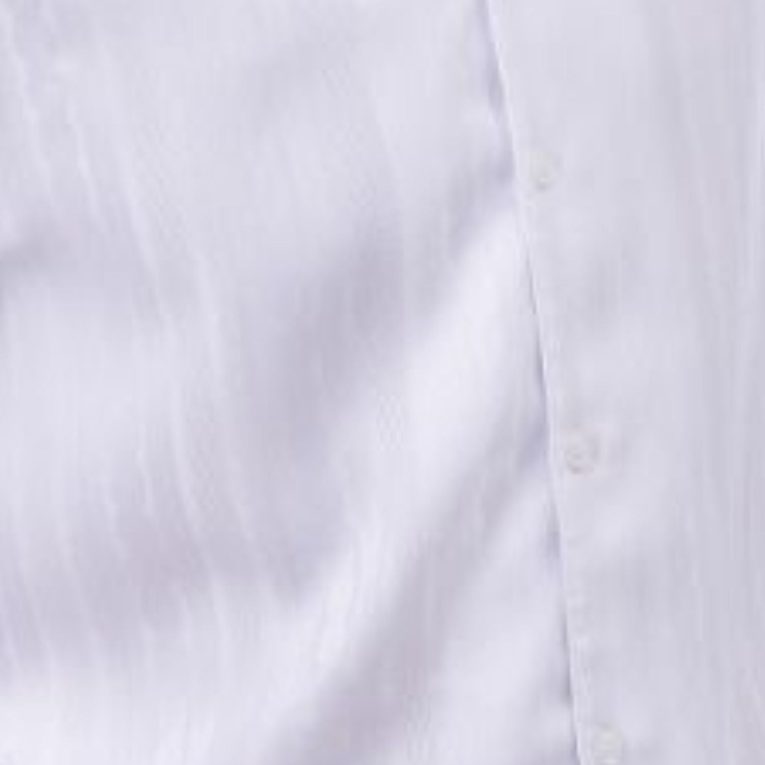 Close-up of white walking suit shirt showing the detailed tone-on-tone cable knit texture.