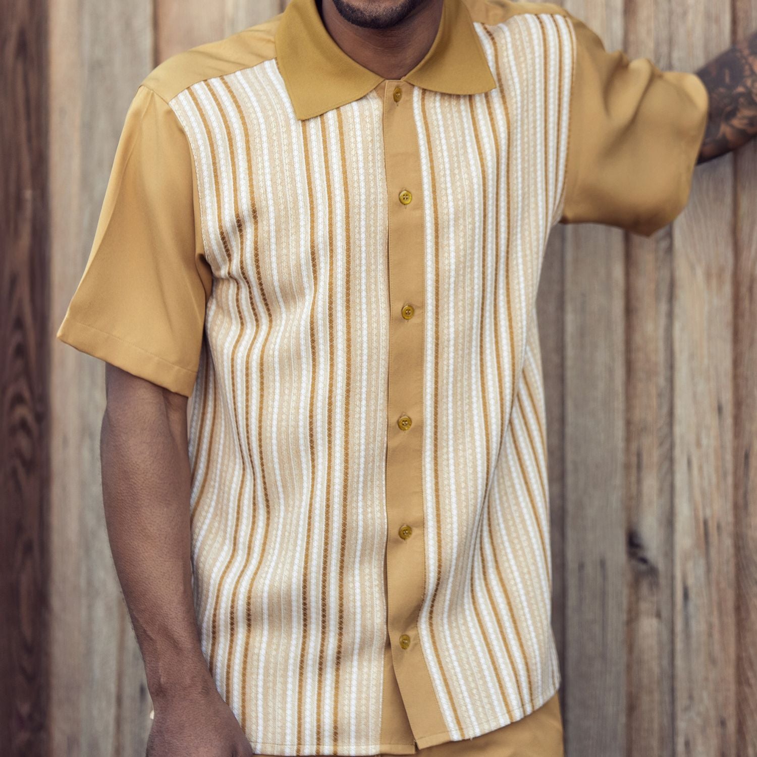 Mustard polyester men's walking suit short sleeve front view showing smooth fabric and matching pants.