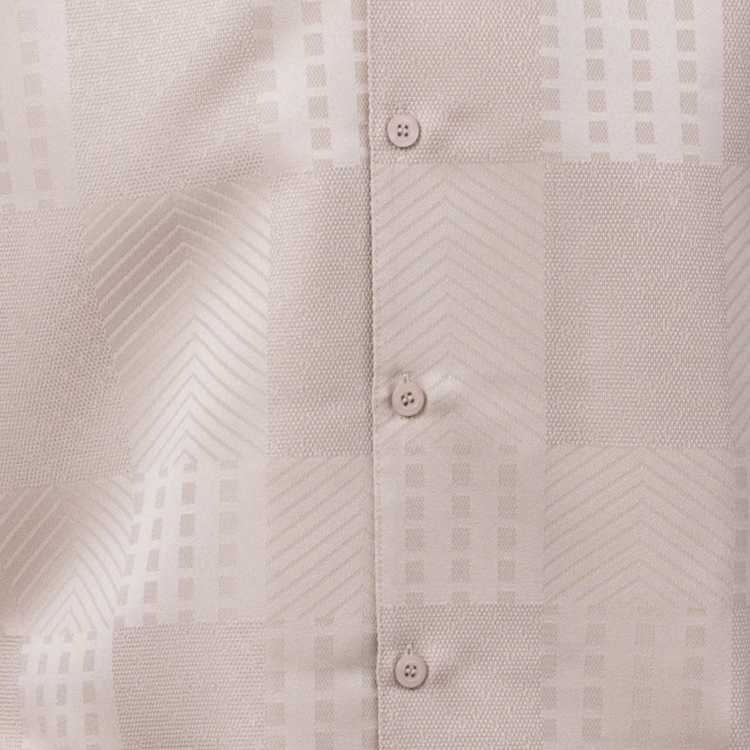 Close-up of khaki walking suit shirt showing the detailed tonal jacquard patchwork pattern.