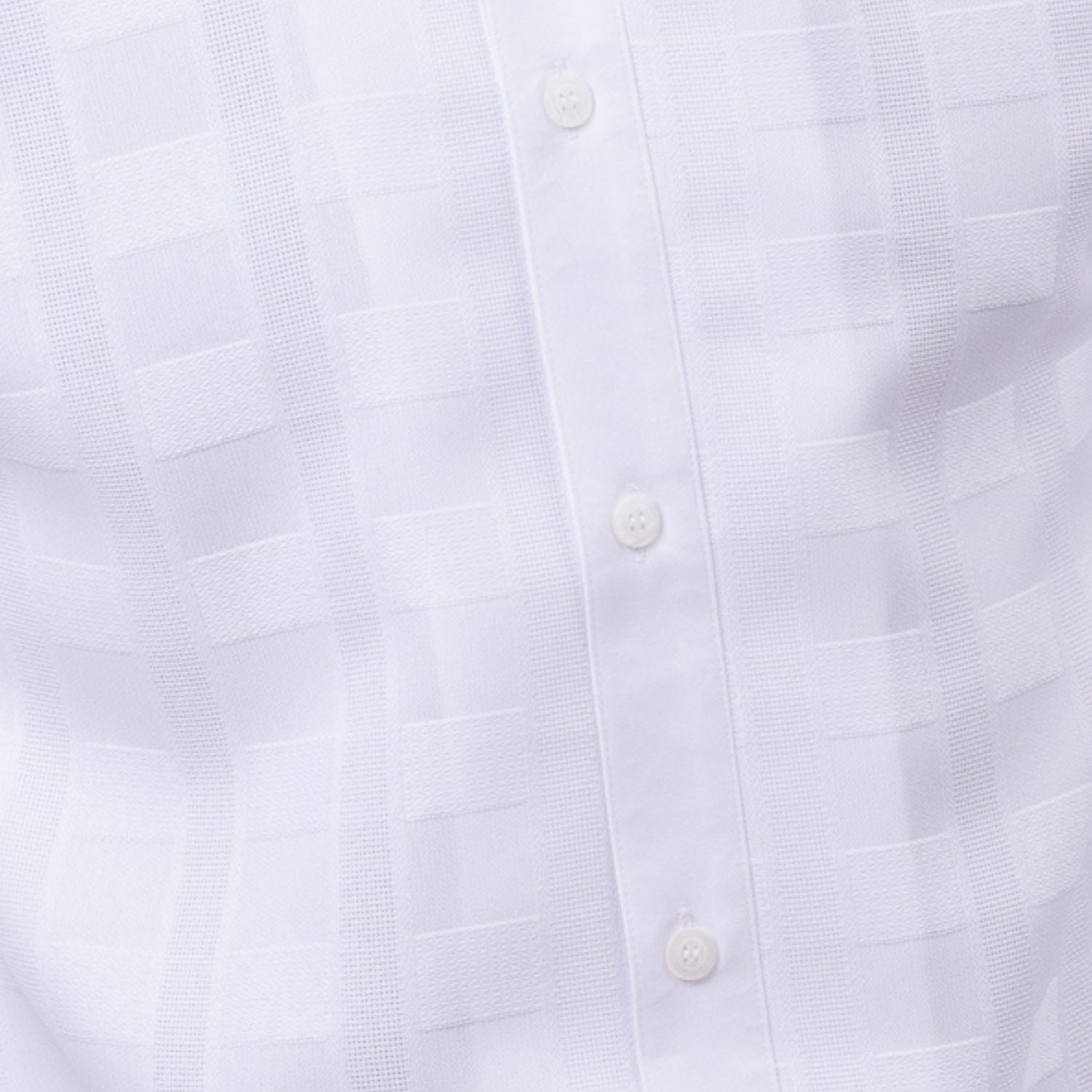 Close-up of white walking suit shirt showing the detailed textured tone-on-tone weave pattern.