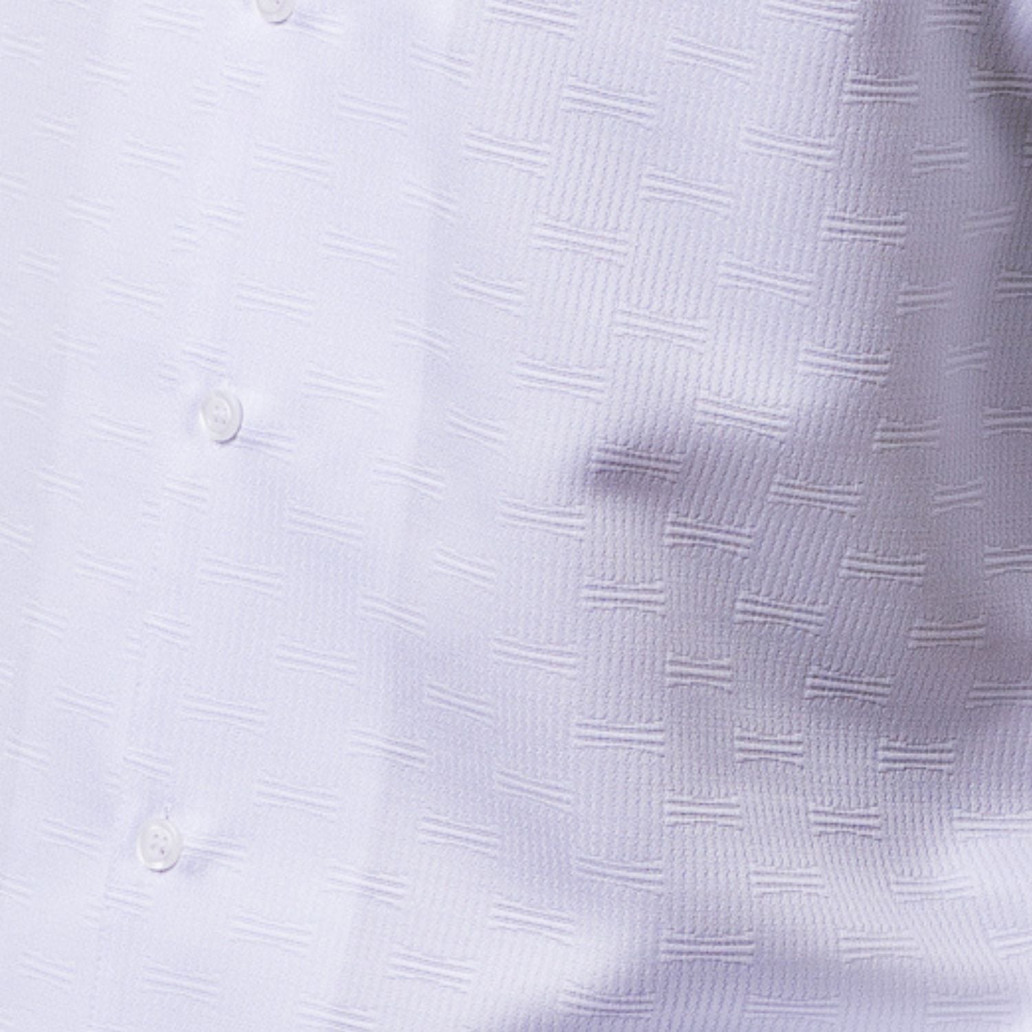Close-up of white men's walking suit shirt showing the detailed tonal geometric woven texture.