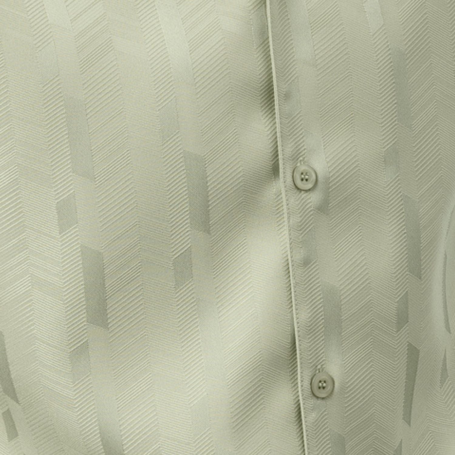 Close-up of mint walking suit shirt showing the detailed tone-on-tone jacquard weave pattern.