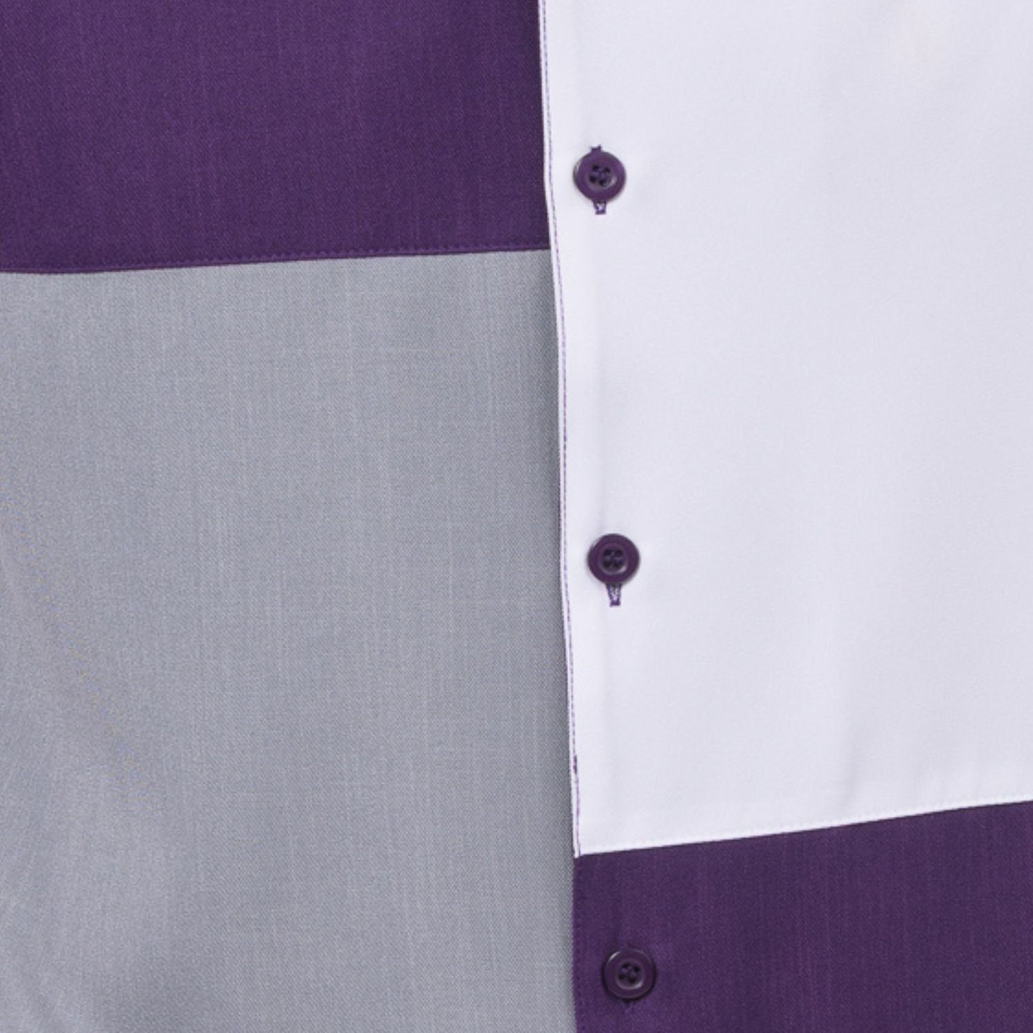 Close-up of purple and grey walking suit shirt showing the clean color block panels and coordinated tonal buttons.
