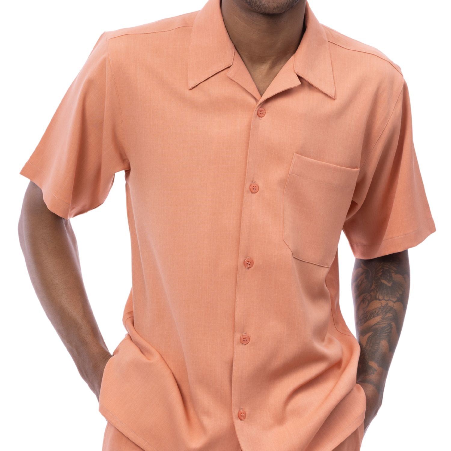 Front view of the peach solid short sleeve men's walking suit shirt.
