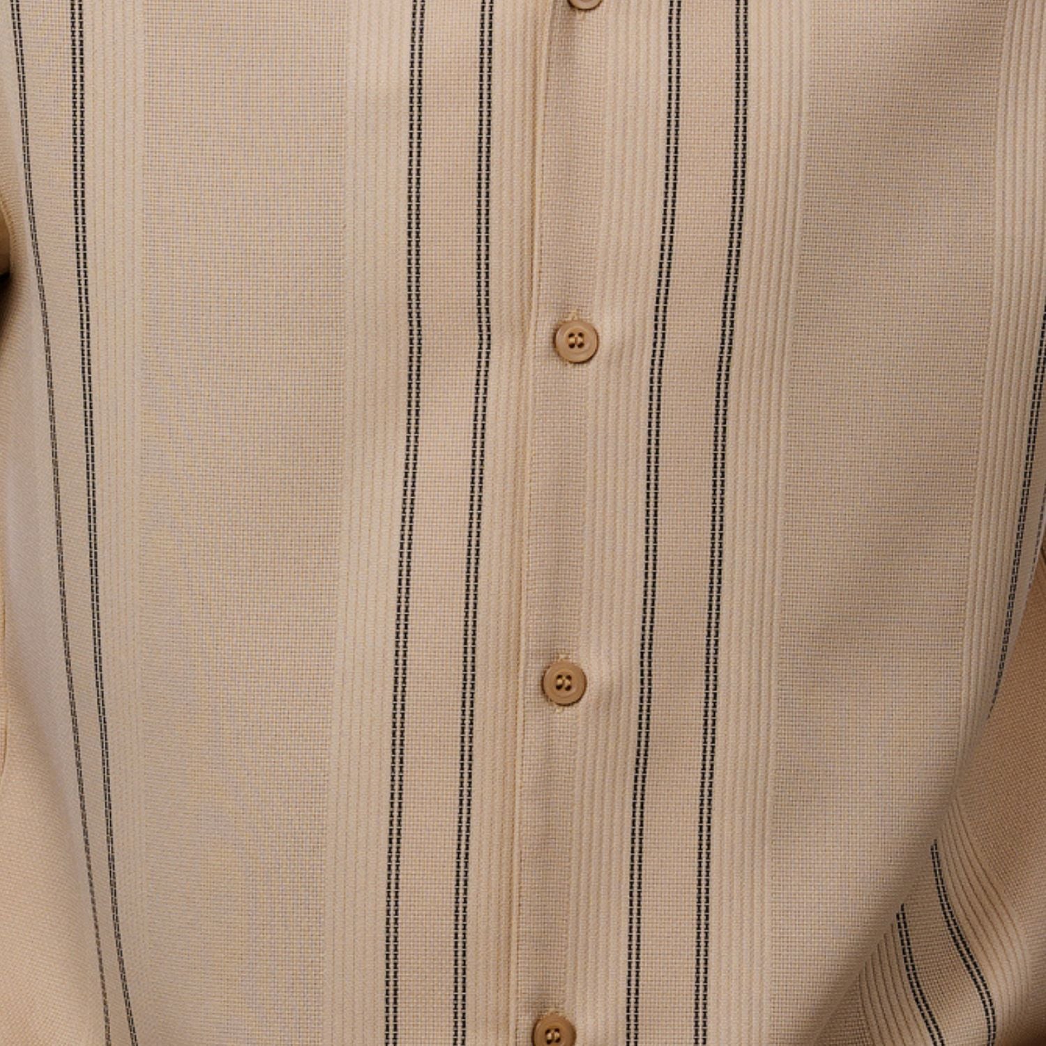 Close-up of beige shirt fabric showing the detailed micro-grid texture and vertical contrast lines.