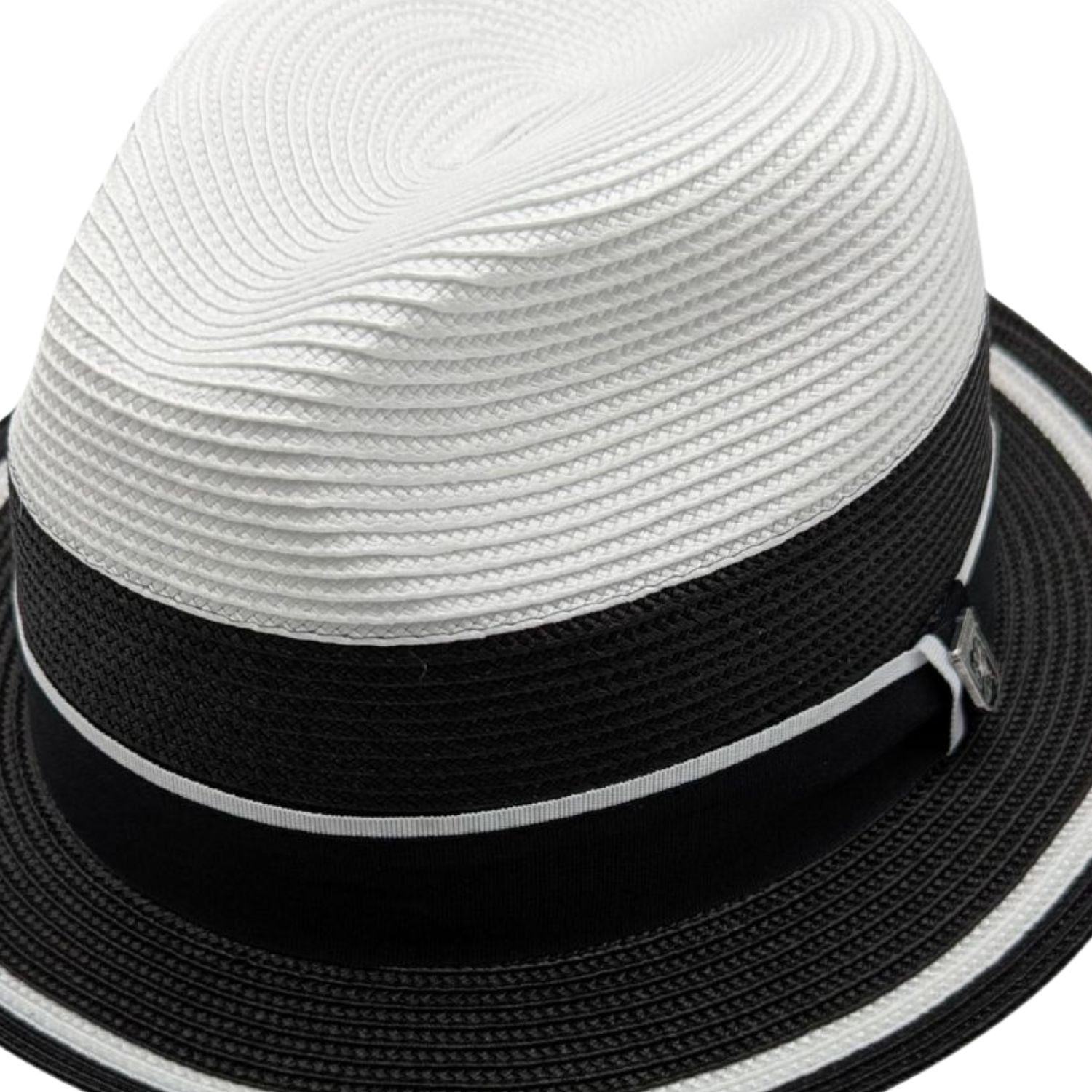 Close-up black brim and ribbon detail on white fedora