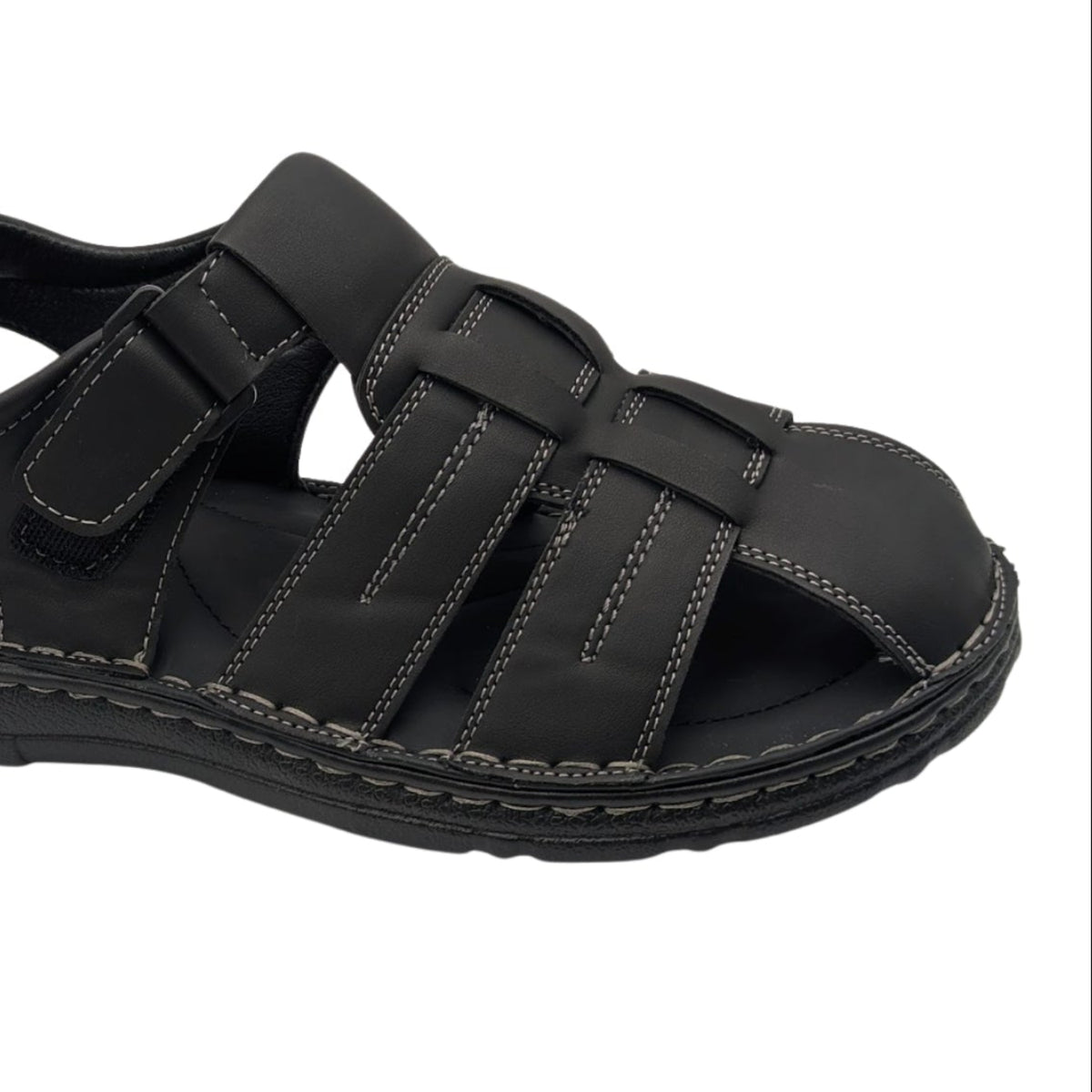 black closed toe fisherman sandal with contrast stitching side view close up