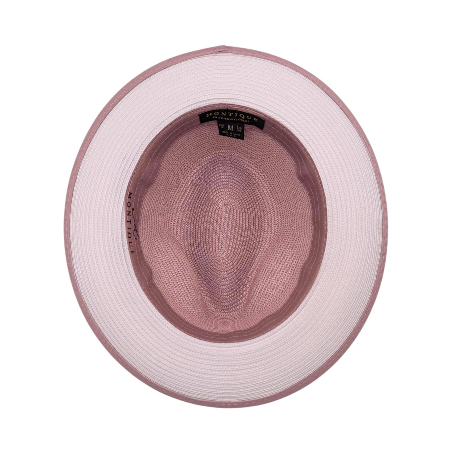Blush and white Montique fedora hat interior view with blush crown, white brim underside, blush edge trim, and branded sweatband