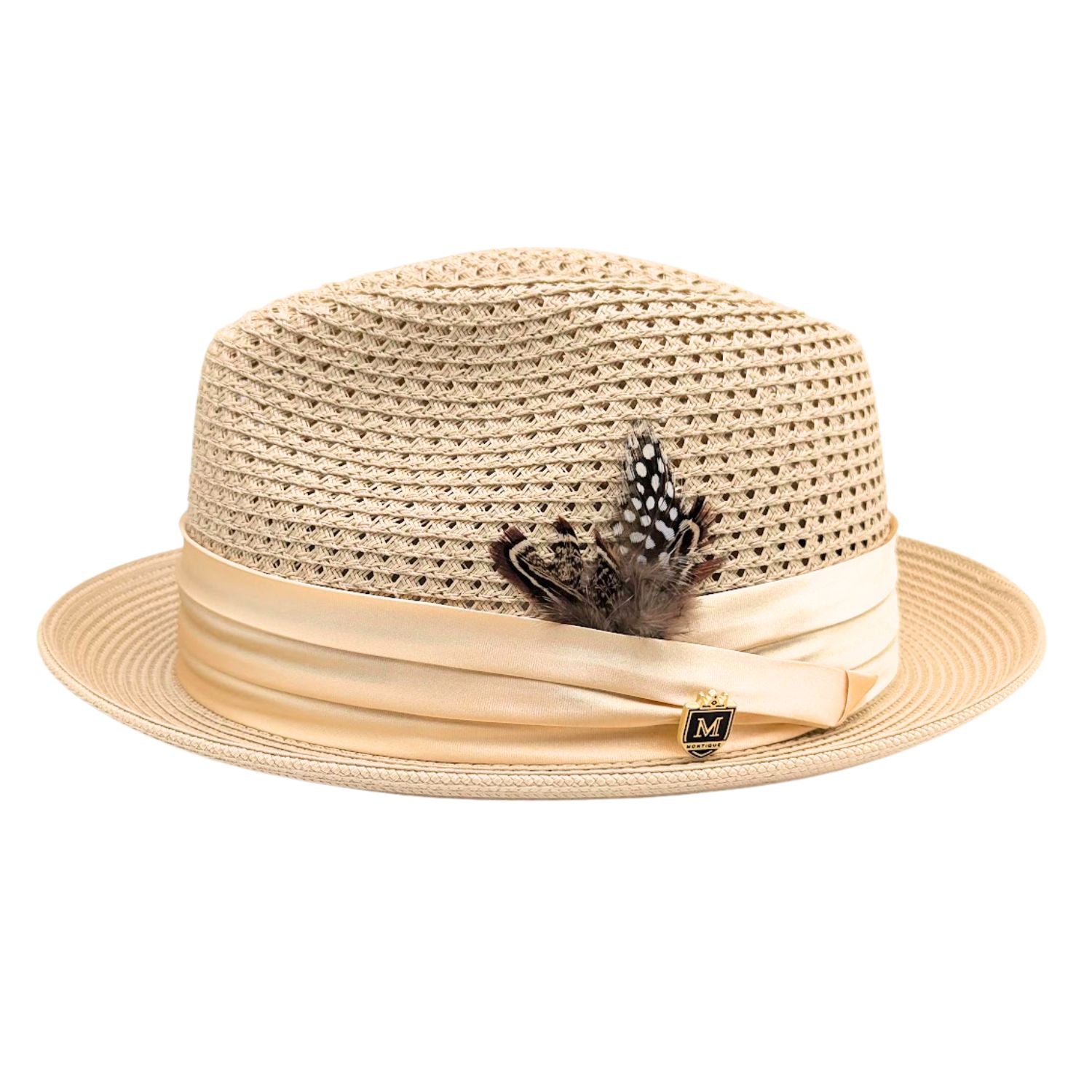 Beige Montique fedora hat side view with open weave crown, satin ribbon band, logo pin, and clean white brim