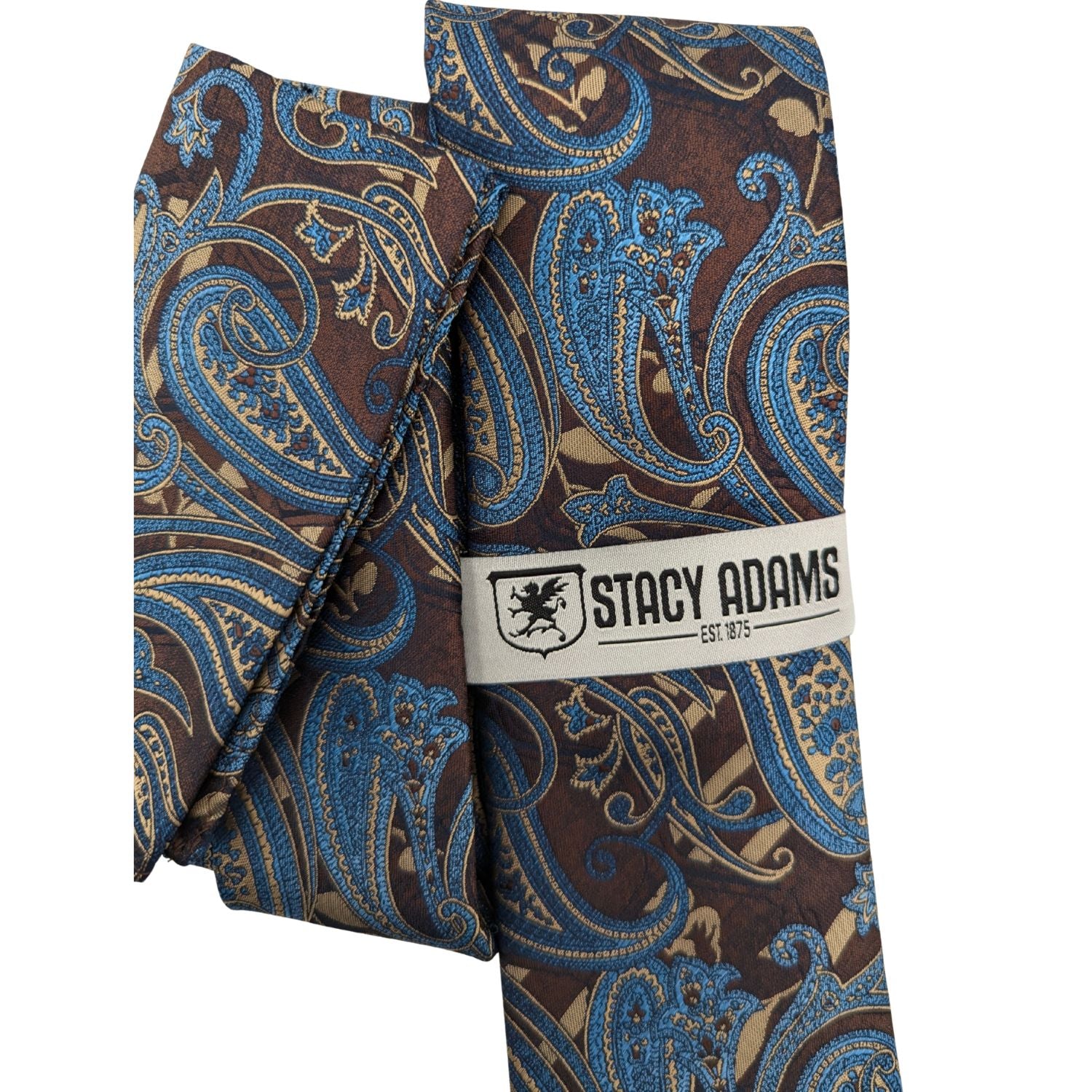 Close-up of the layered chocolate and blue paisley pattern from the Crimson Cipher Collection.