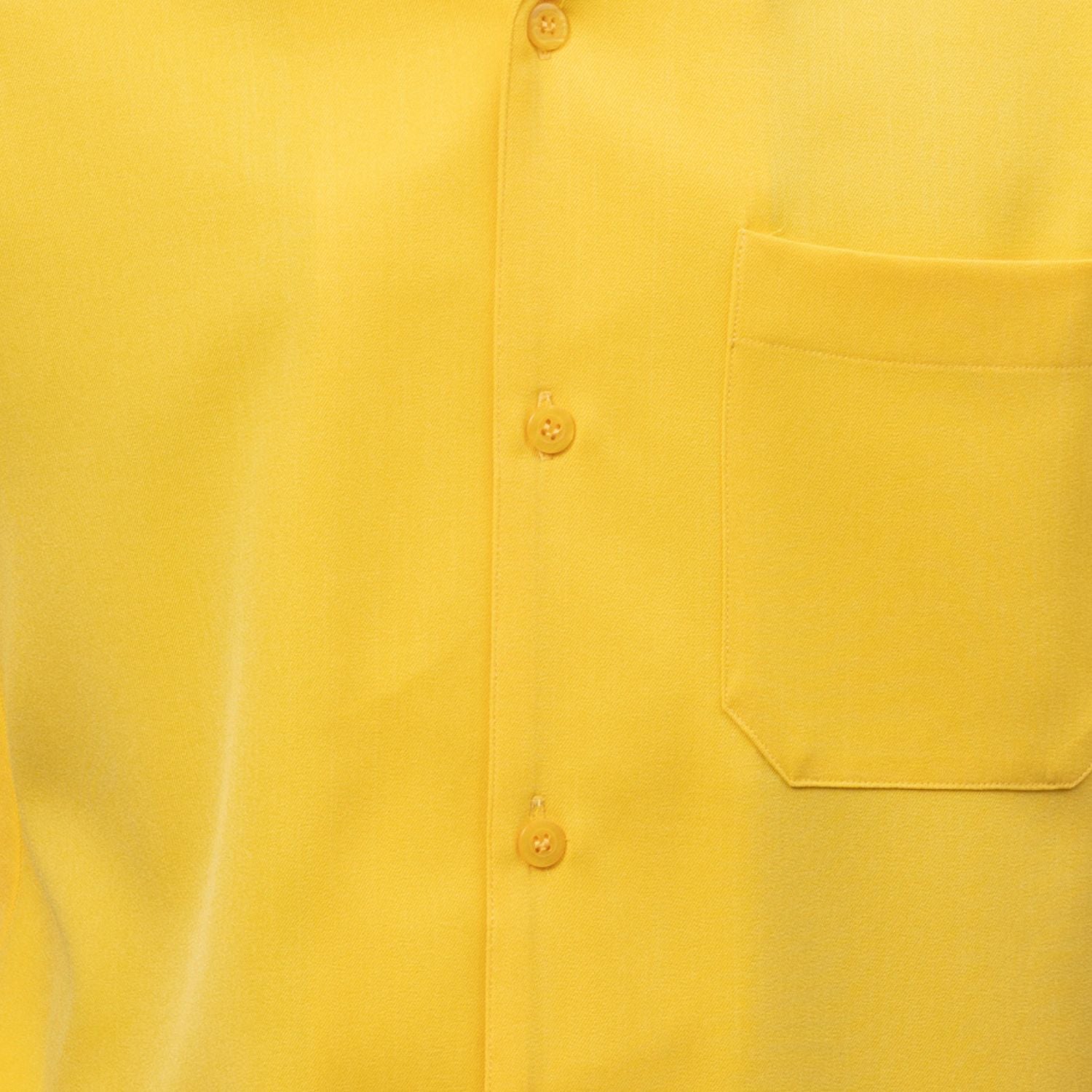 Close-up of canary solid walking suit shirt showing the open collar and clean button-front design.