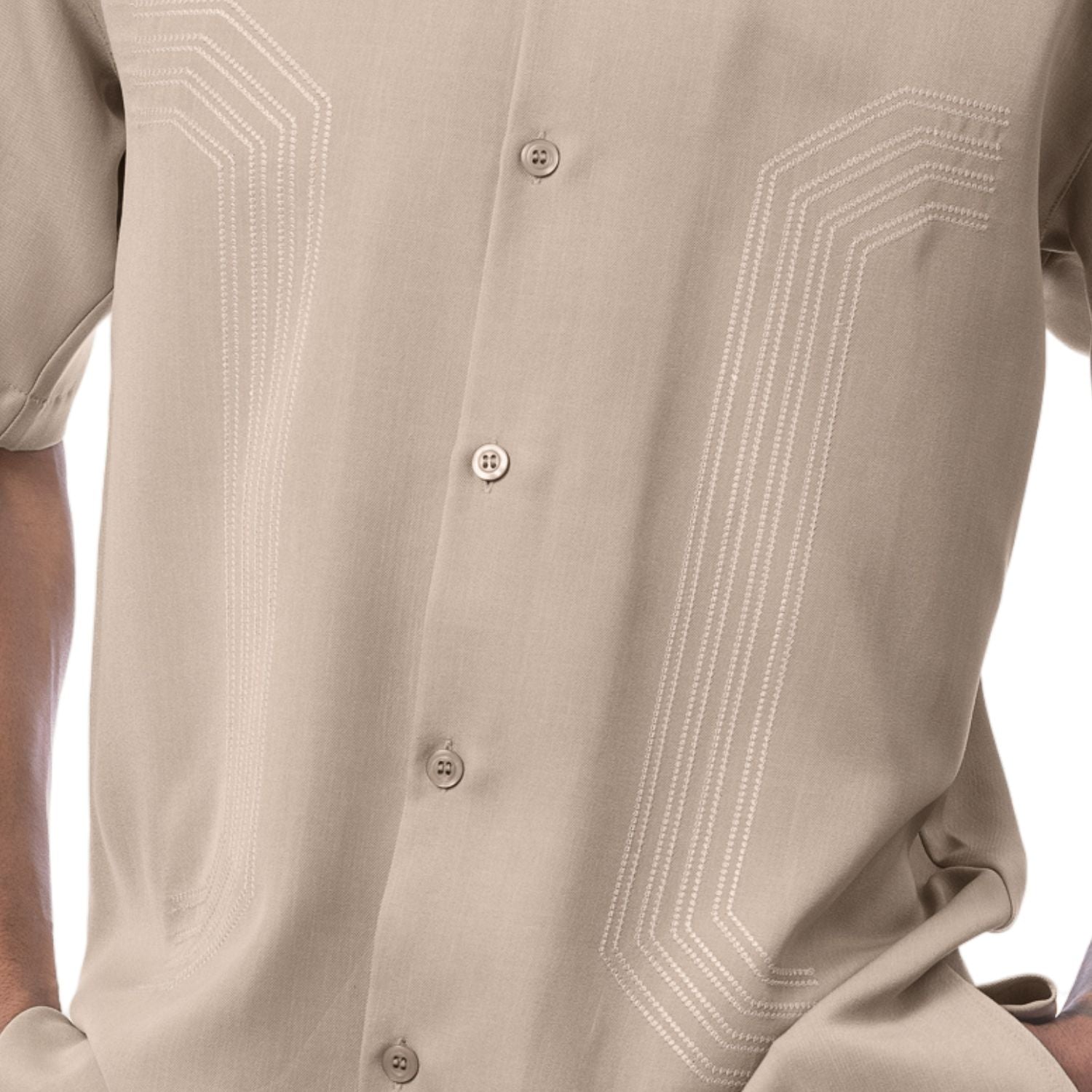 Close up of embroidered panel detail on khaki walking suit shirt