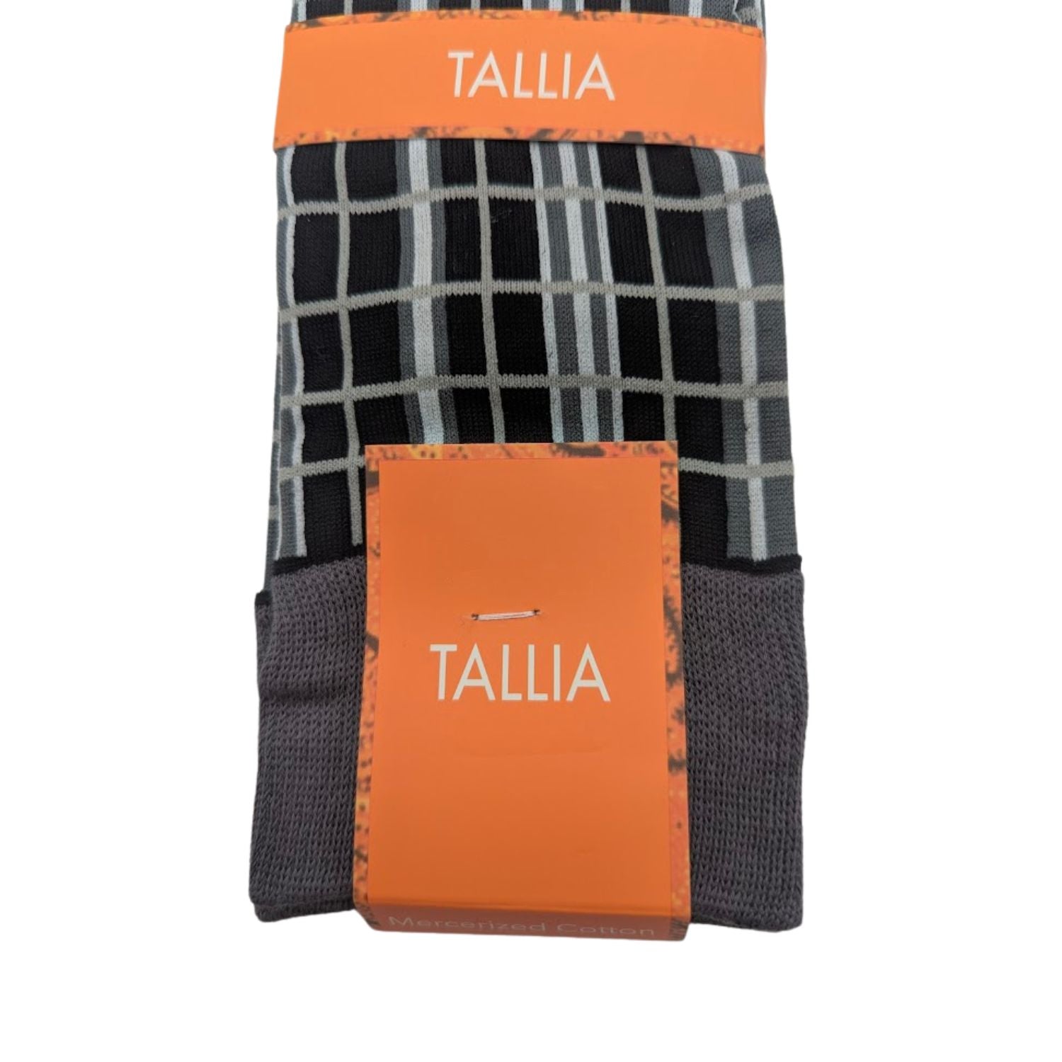 close up of black grey dress socks with grid pattern