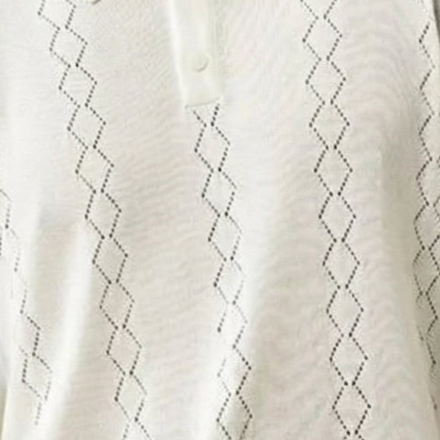 white short sleeve woven knit polo with vertical textured pattern fabric details