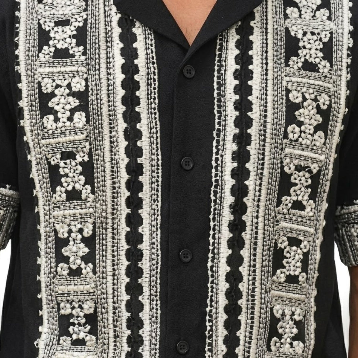 Close-up of black embroidered short sleeve walking suit shirt by Stacy Adams