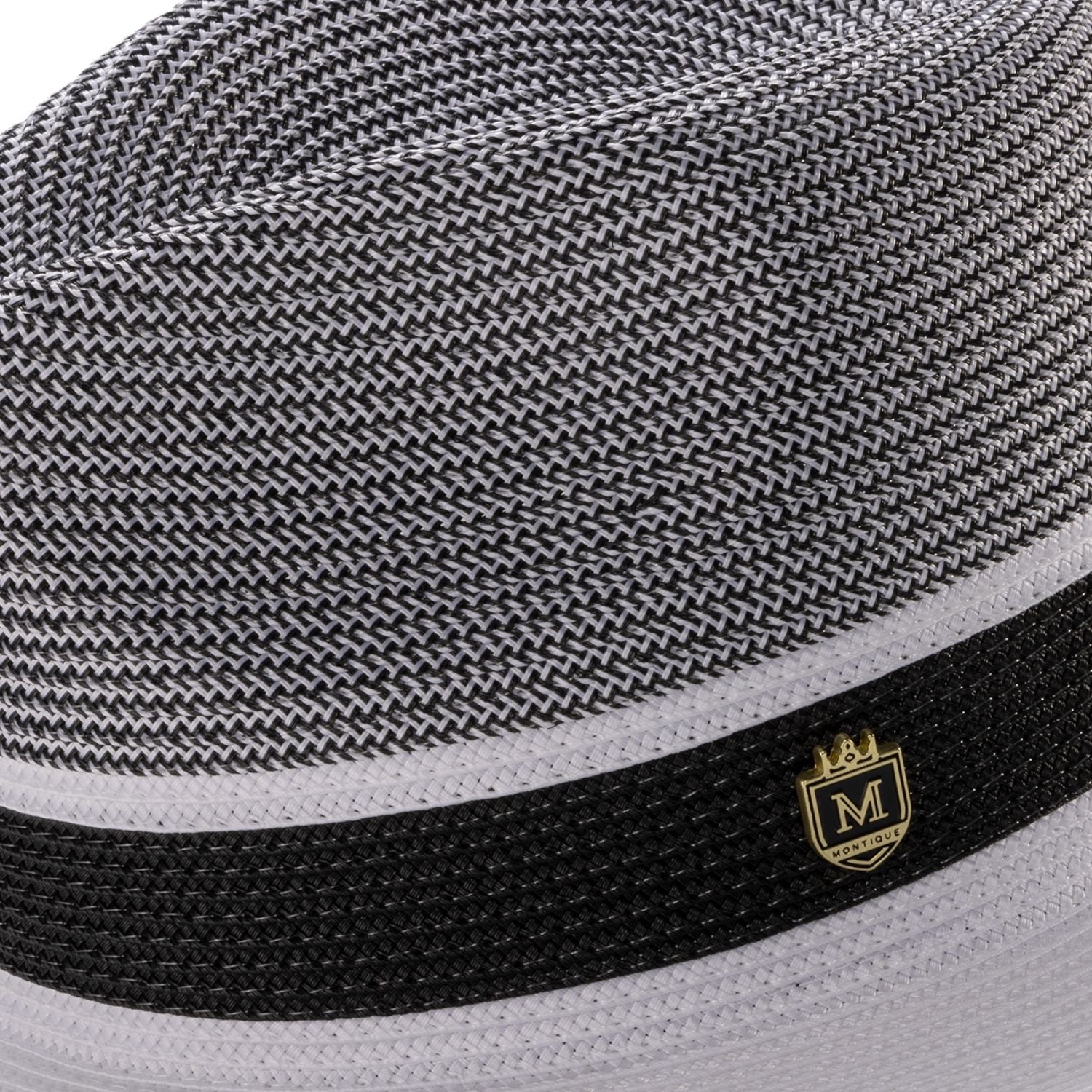 Close up of white wide brim straw fedora hat pinch crown