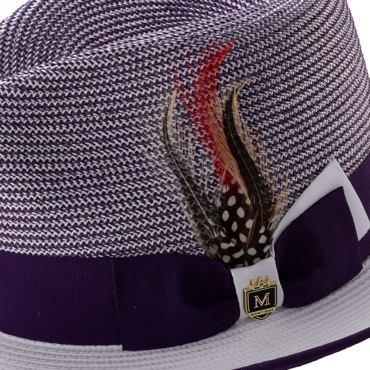 Side view of purple and white Montique fedora hat with ribbon and feather