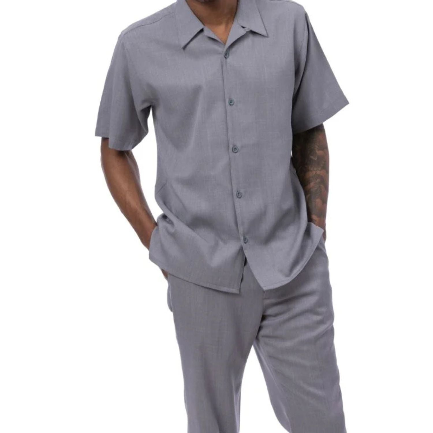 Side view of a male model wearing the grey linen look walking suit