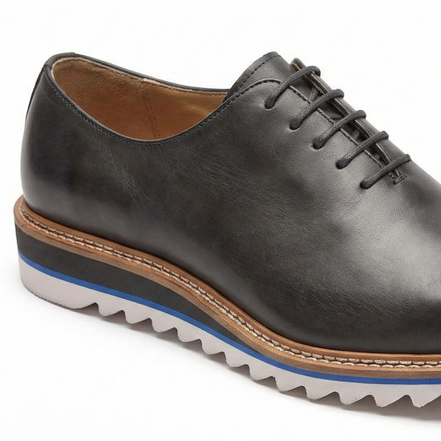 close up of charcoal plain toe lace-up leather dress shoes