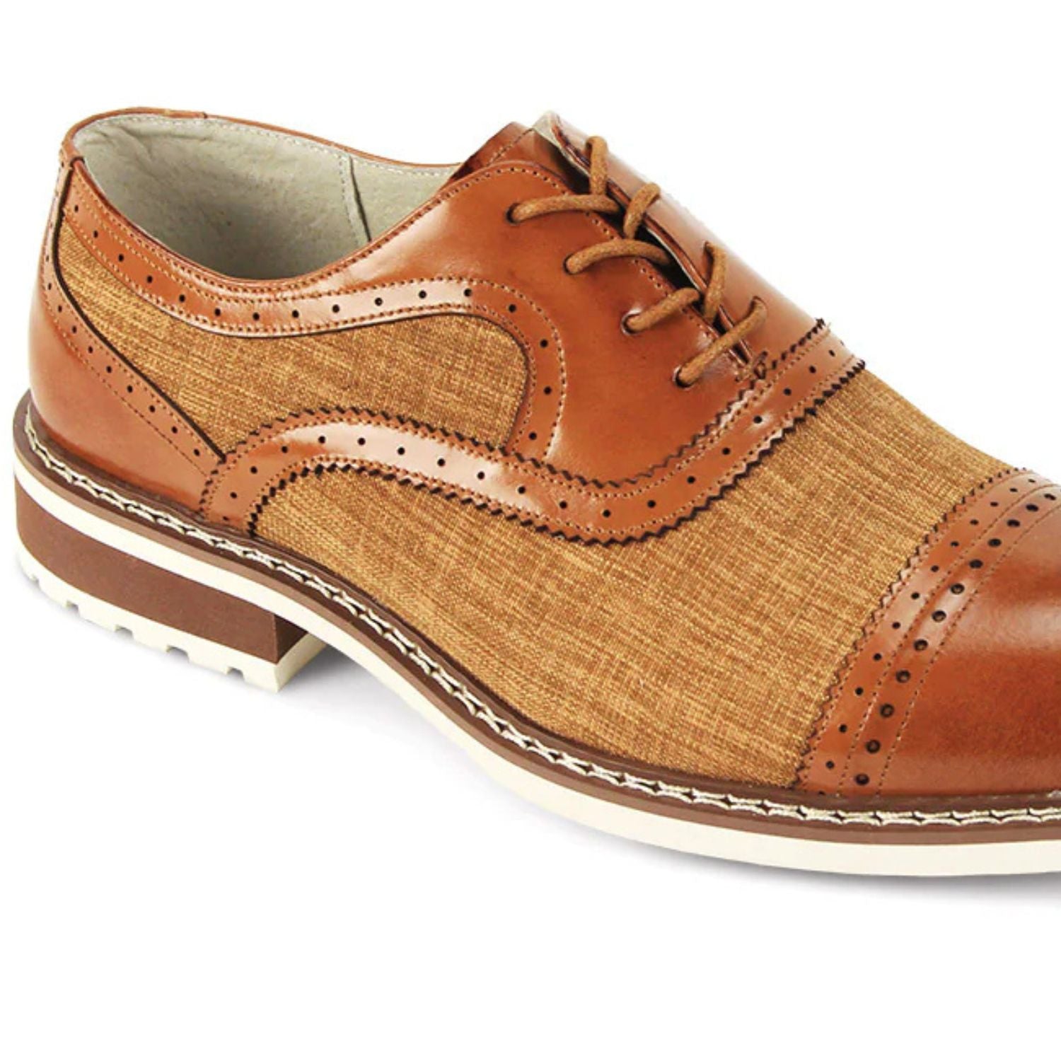 Close-up of maple leather brogue detailing and textured golden-brown tweed fabric.