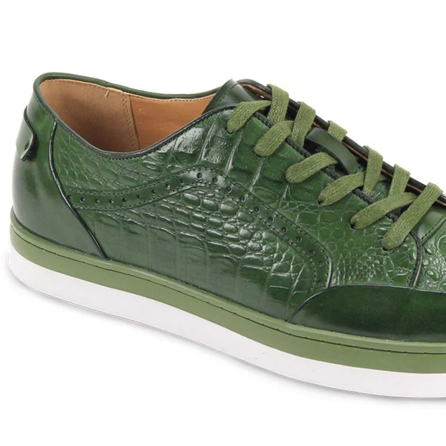 Close-up of green embossed croc texture and smooth leather sneaker finish