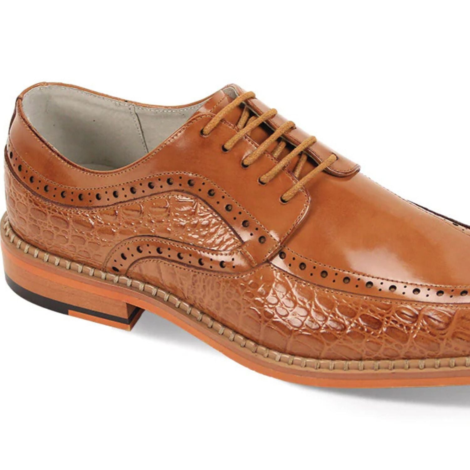 Close-up of tan embossed coco-print leather texture and moc-toe stitching detail